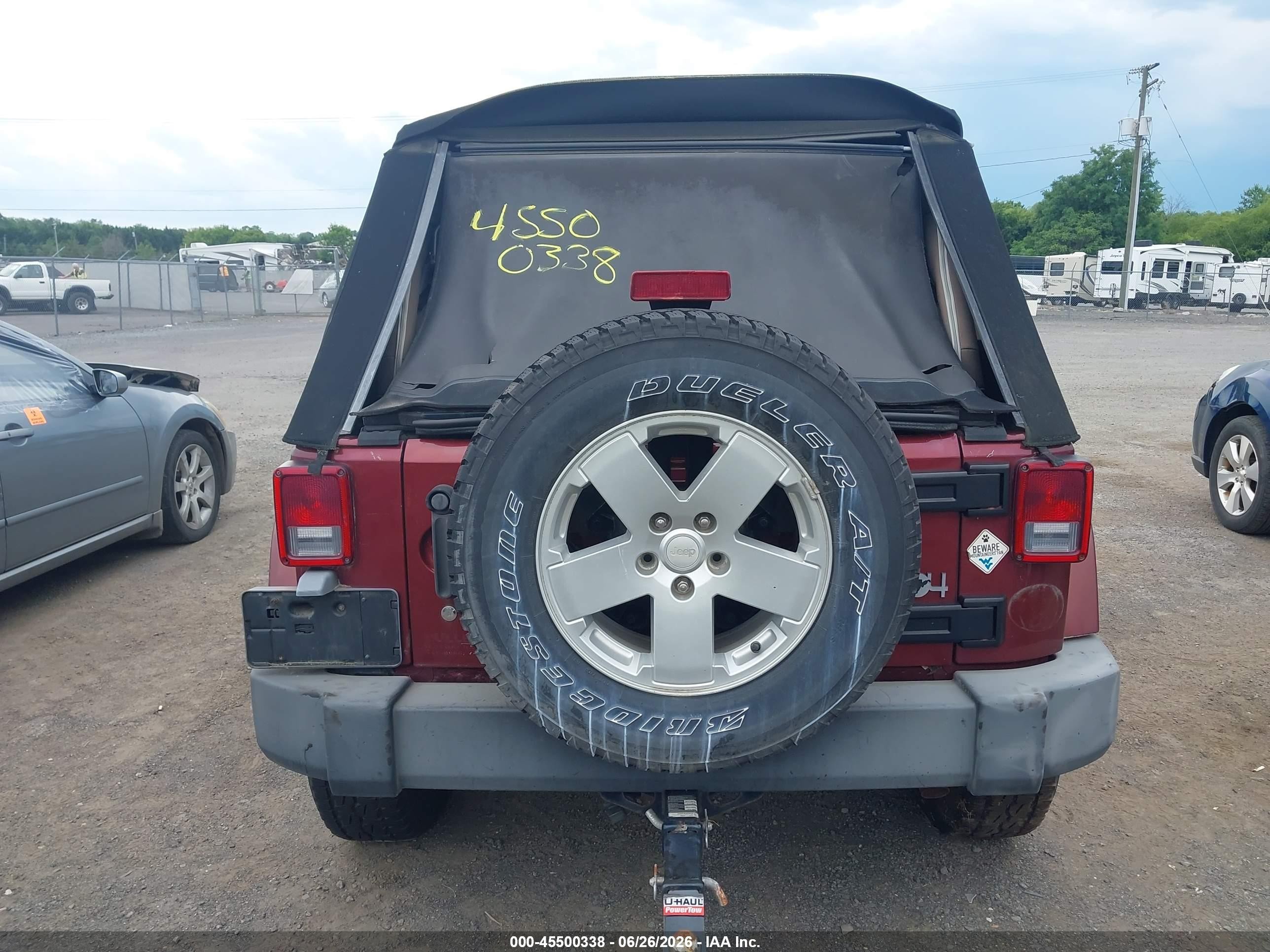 2007 Jeep Wrangler Unlimited Sahara Burgundy vin: 1J4GA59117L157902