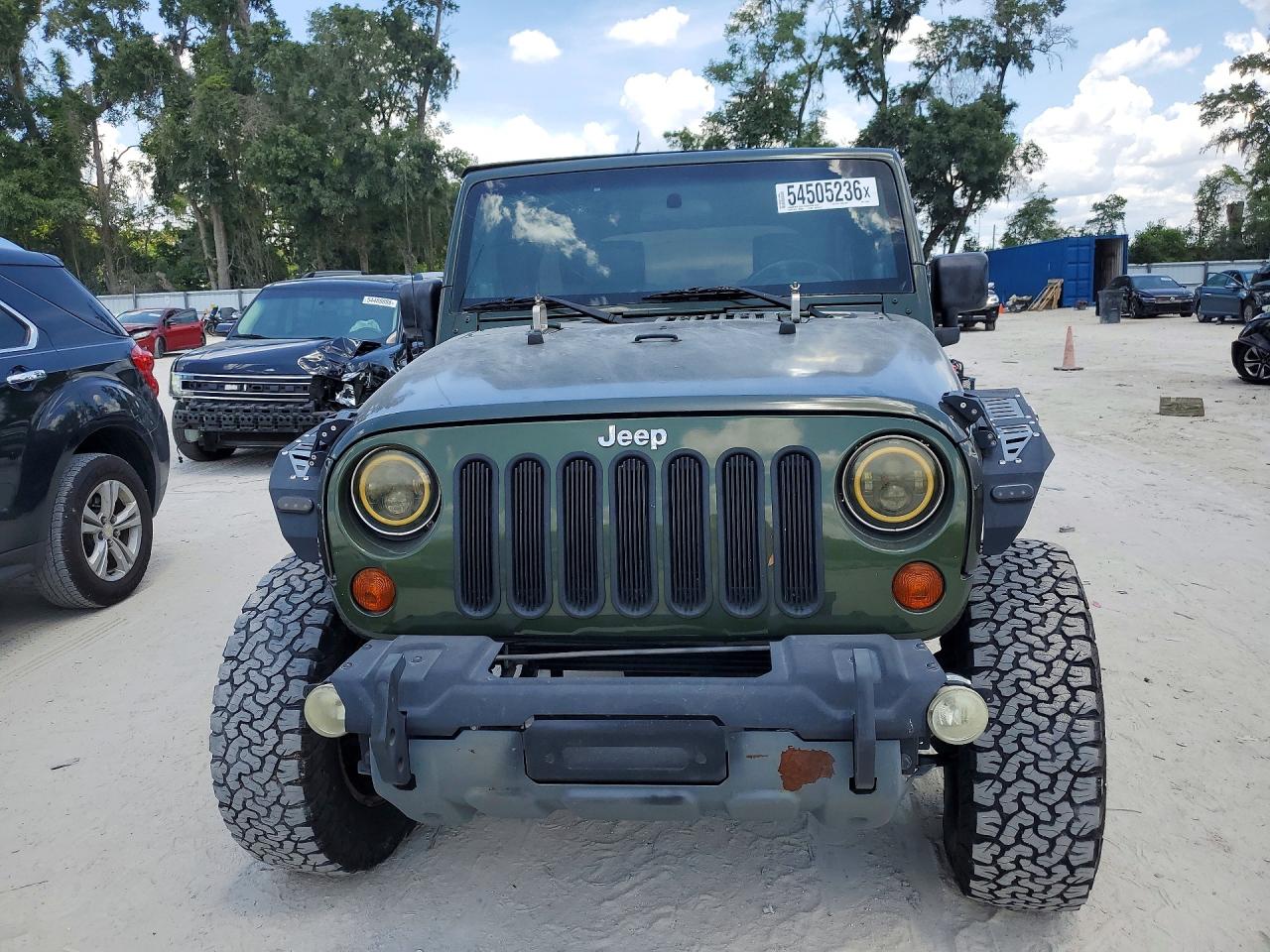 2009 Jeep Wrangler Unlimited Sahara Green vin: 1J4GA59119L717033