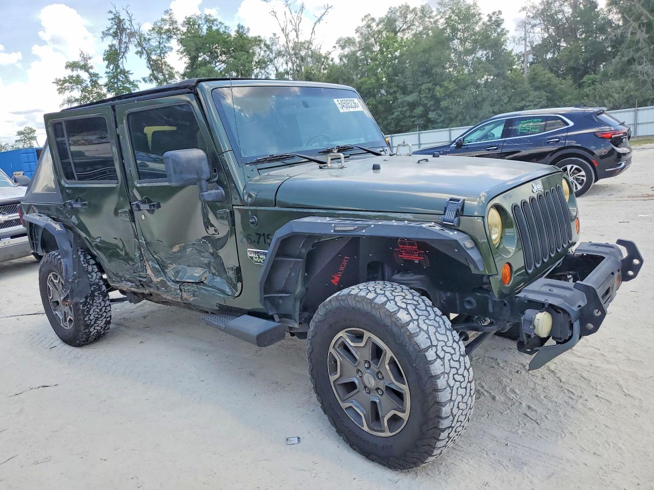 2009 Jeep Wrangler Unlimited Sahara Green vin: 1J4GA59119L717033
