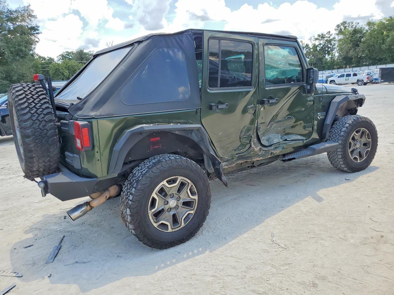 2009 Jeep Wrangler Unlimited Sahara Green vin: 1J4GA59119L717033