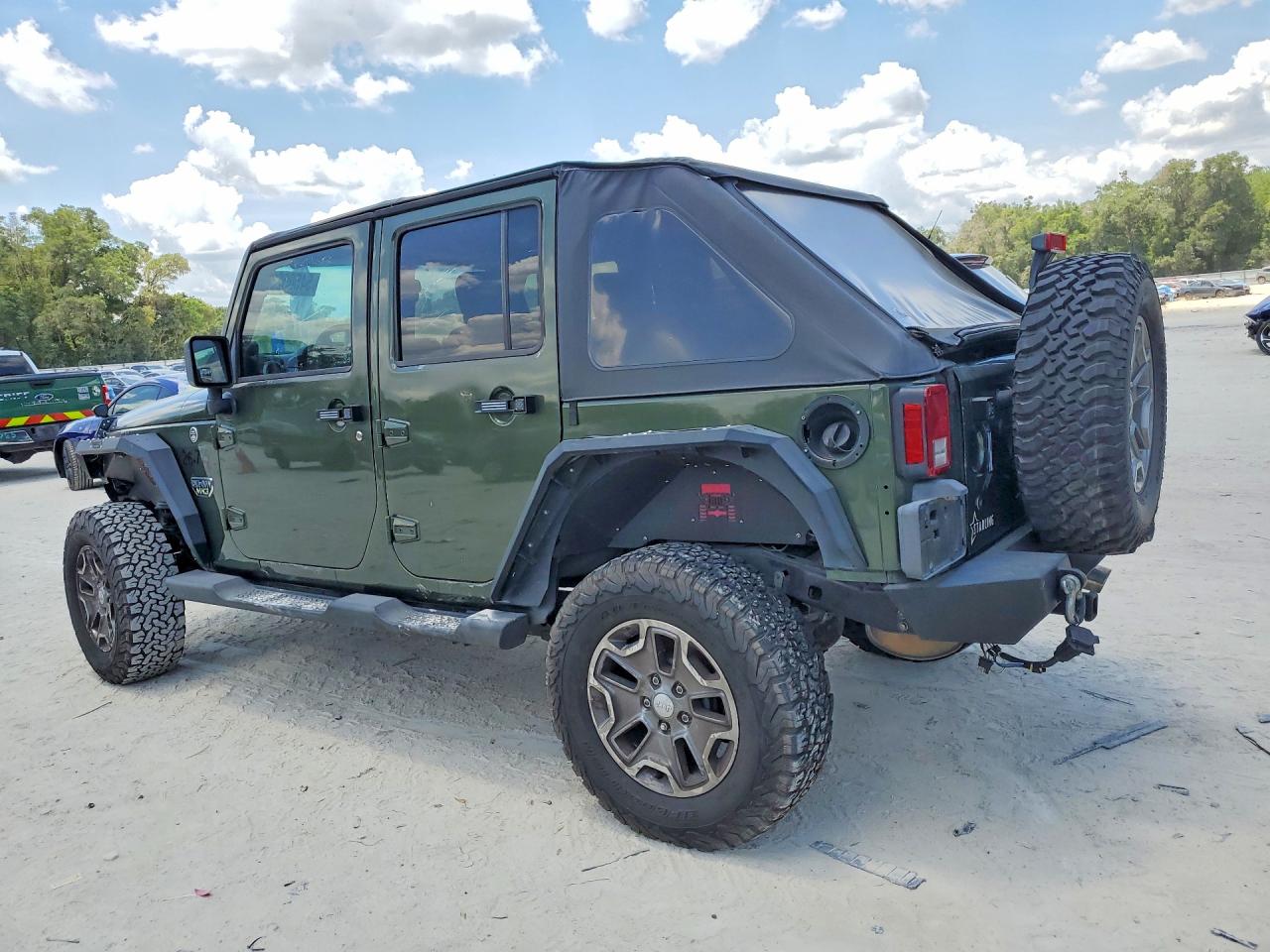 2009 Jeep Wrangler Unlimited Sahara Green vin: 1J4GA59119L717033