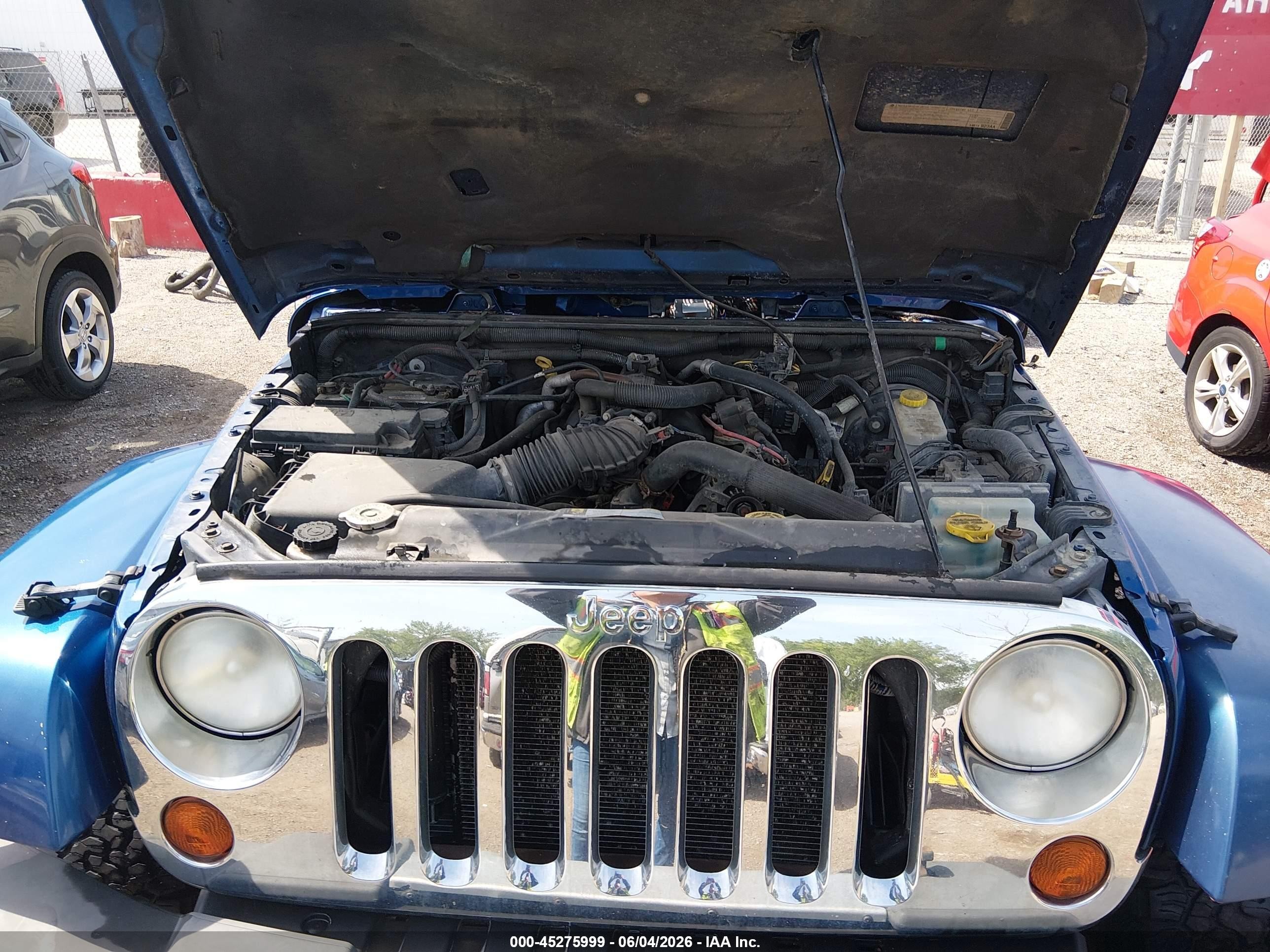 2009 Jeep Wrangler Unlimited Sahara Blue vin: 1J4GA59119L754275
