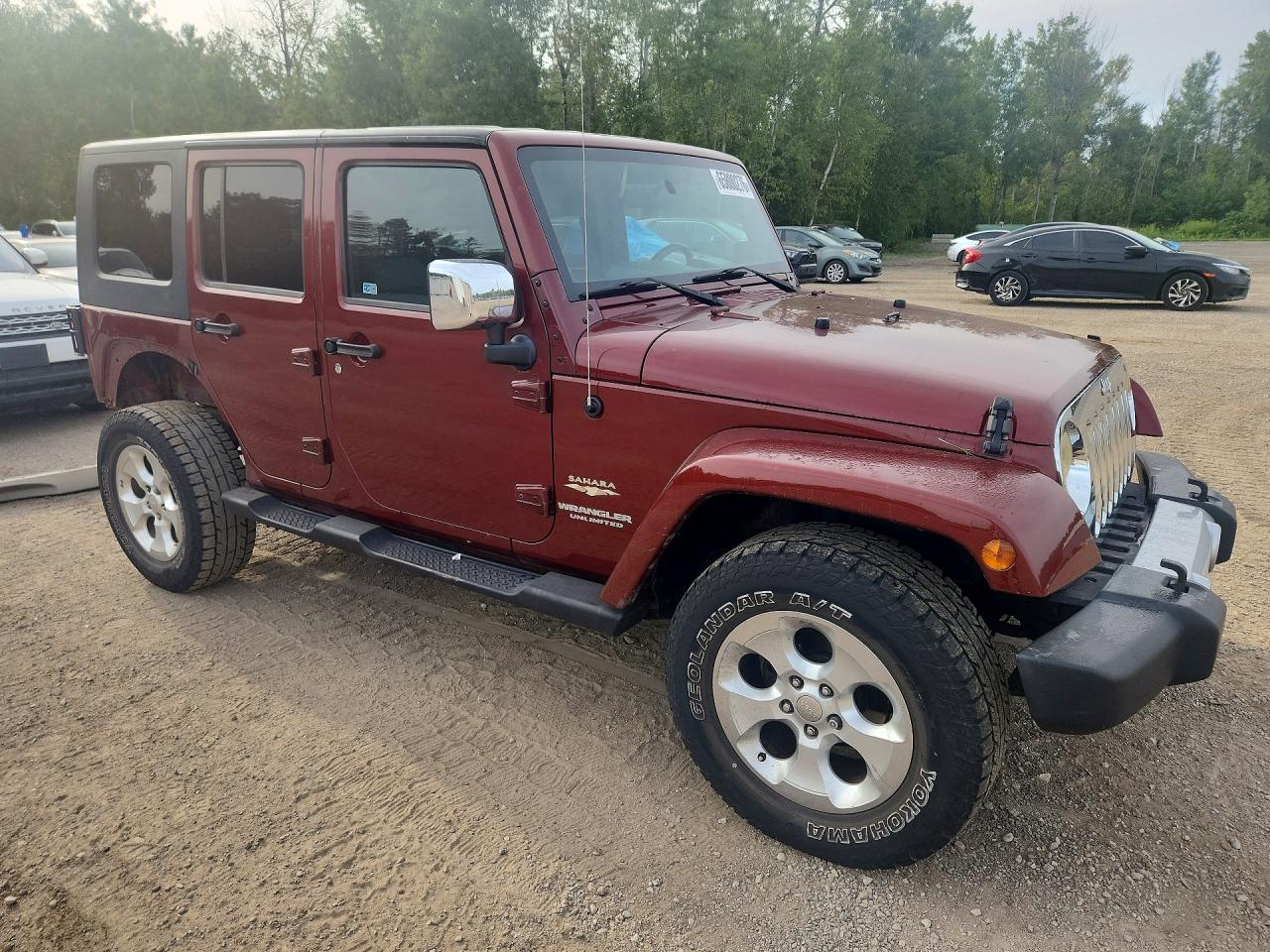 2008 Jeep Wrangler Unlimited Sahara Red vin: 1J4GA59138L634377