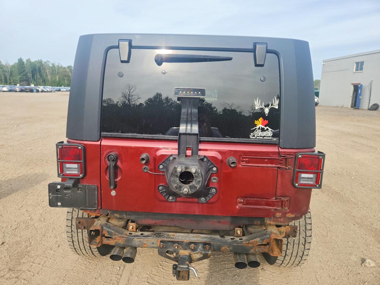 2008 Jeep Wrangler Unlimited Sahara Red vin: 1J4GA59138L634377