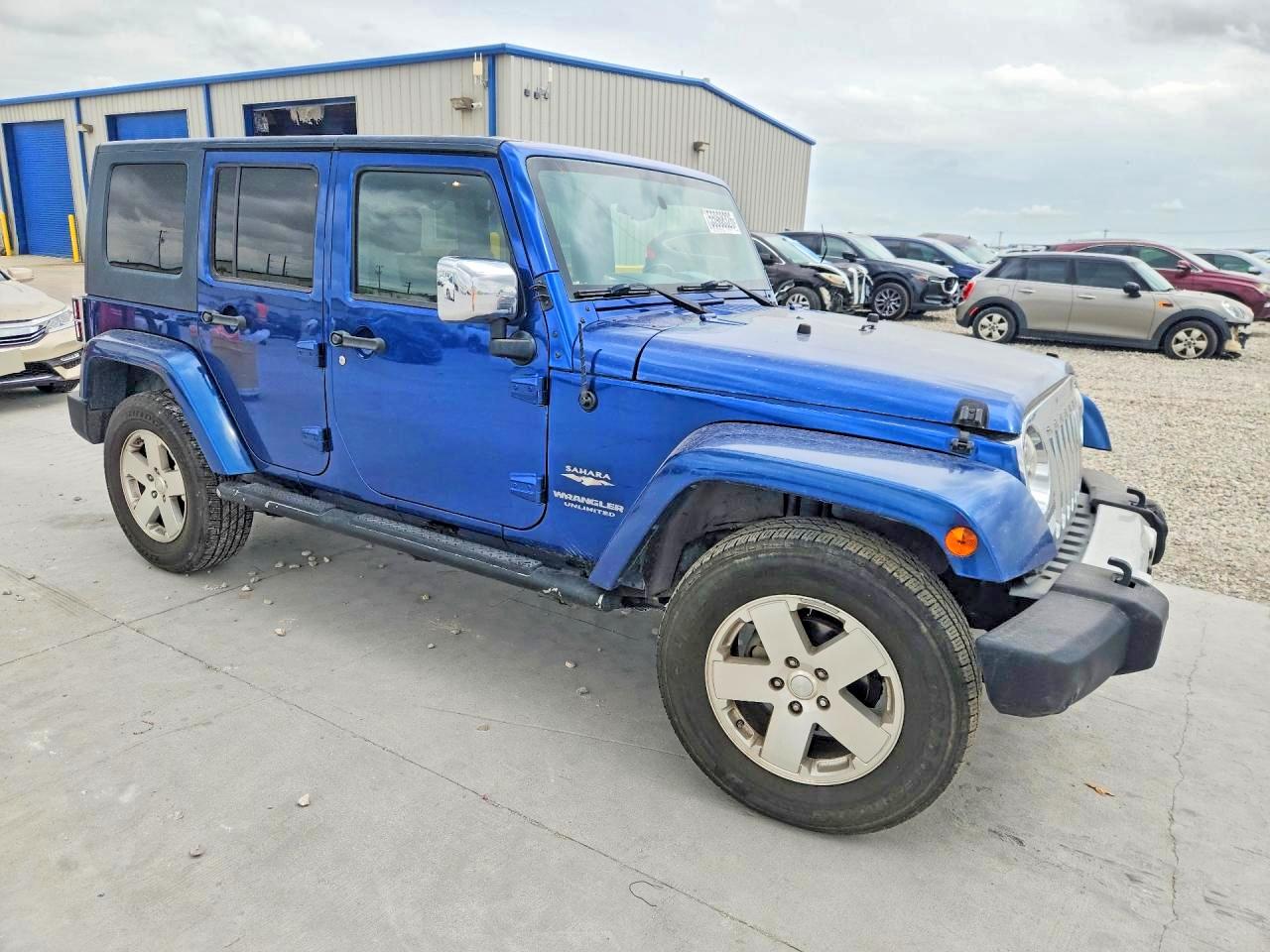 2009 Jeep Wrangler Unlimited Sahara Blue vin: 1J4GA59139L769702