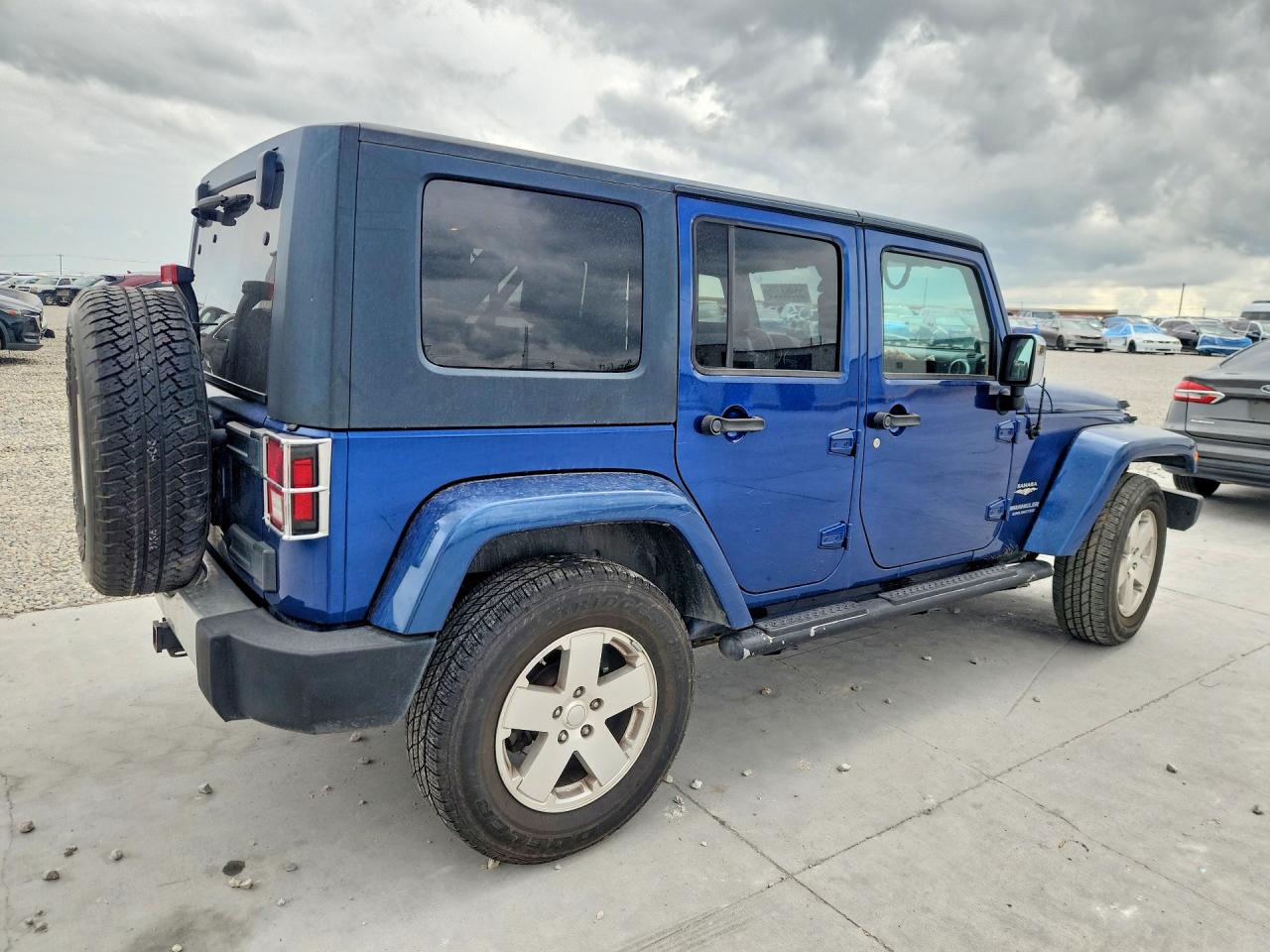2009 Jeep Wrangler Unlimited Sahara Blue vin: 1J4GA59139L769702
