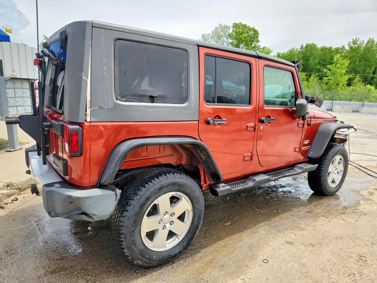 2009 Jeep Wrangler Unlimited Sahara Коричневый vin: 1J4GA59149L746039