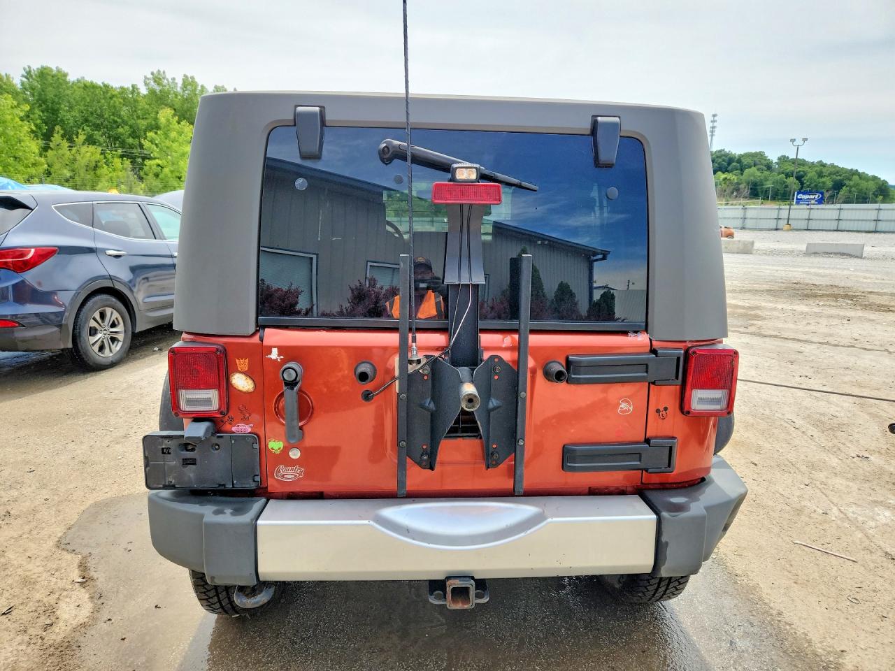 2009 Jeep Wrangler Unlimited Sahara Коричневый vin: 1J4GA59149L746039