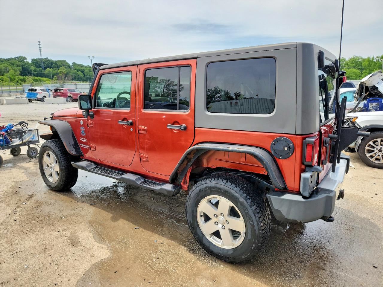 2009 Jeep Wrangler Unlimited Sahara Коричневый vin: 1J4GA59149L746039