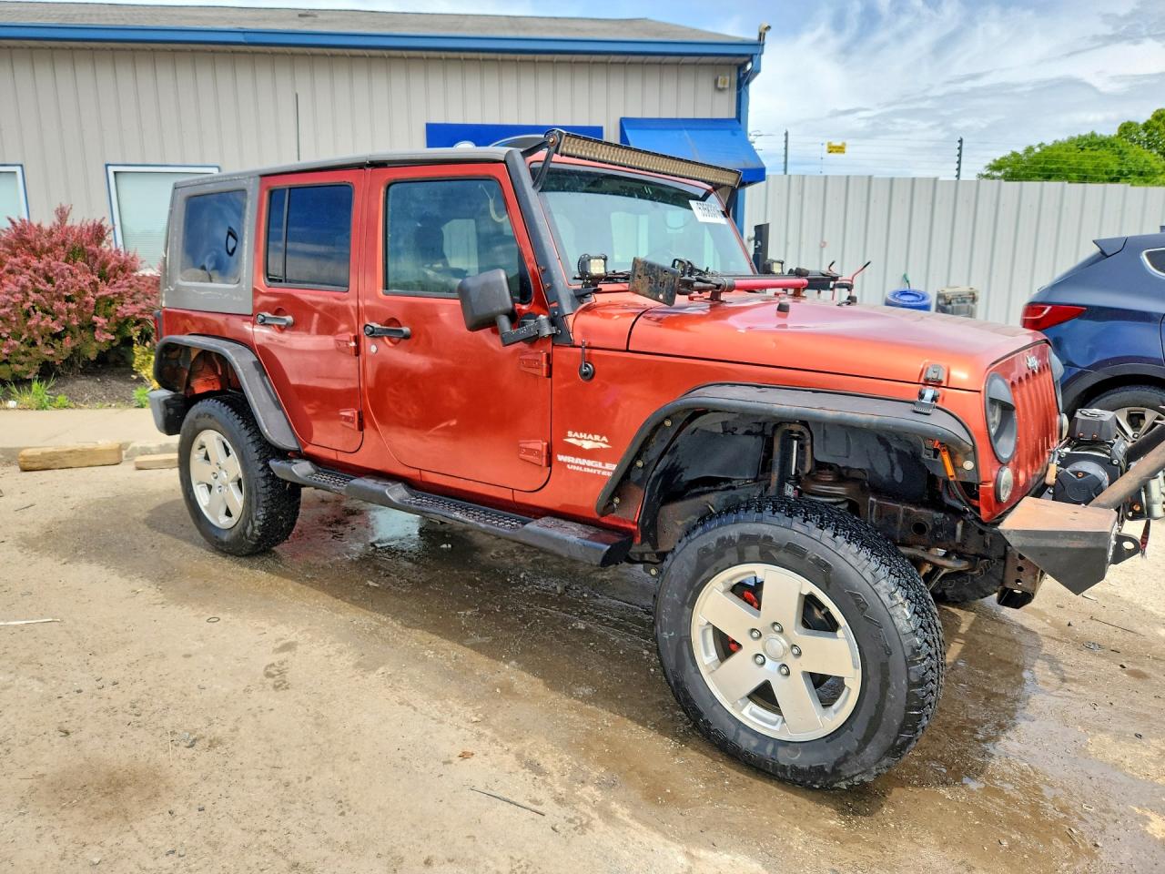 2009 Jeep Wrangler Unlimited Sahara Коричневый vin: 1J4GA59149L746039
