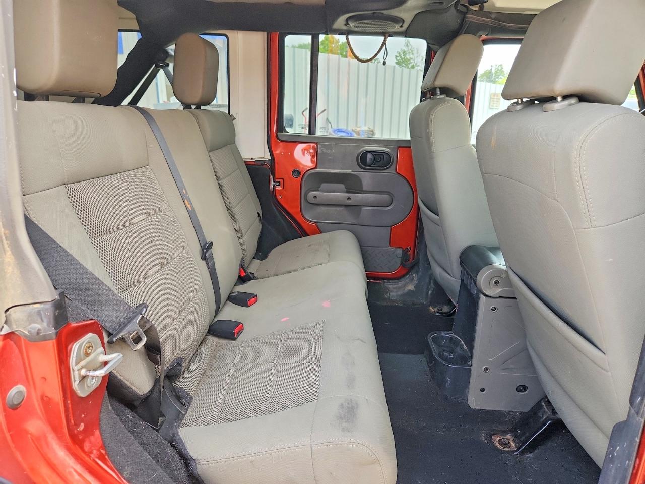 2009 Jeep Wrangler Unlimited Sahara Коричневый vin: 1J4GA59149L746039