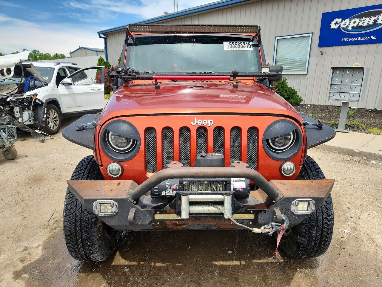 2009 Jeep Wrangler Unlimited Sahara Коричневый vin: 1J4GA59149L746039