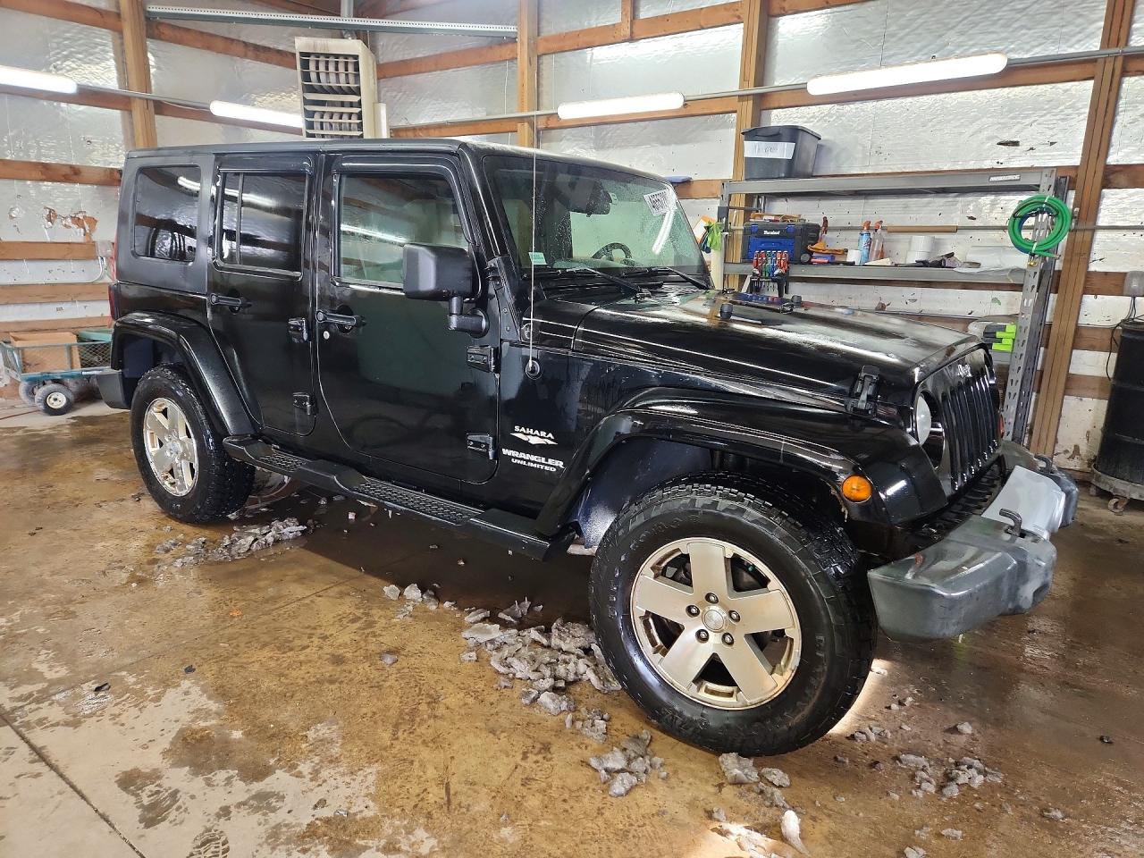 2009 Jeep Wrangler Unlimited Sahara Black vin: 1J4GA59149L749734