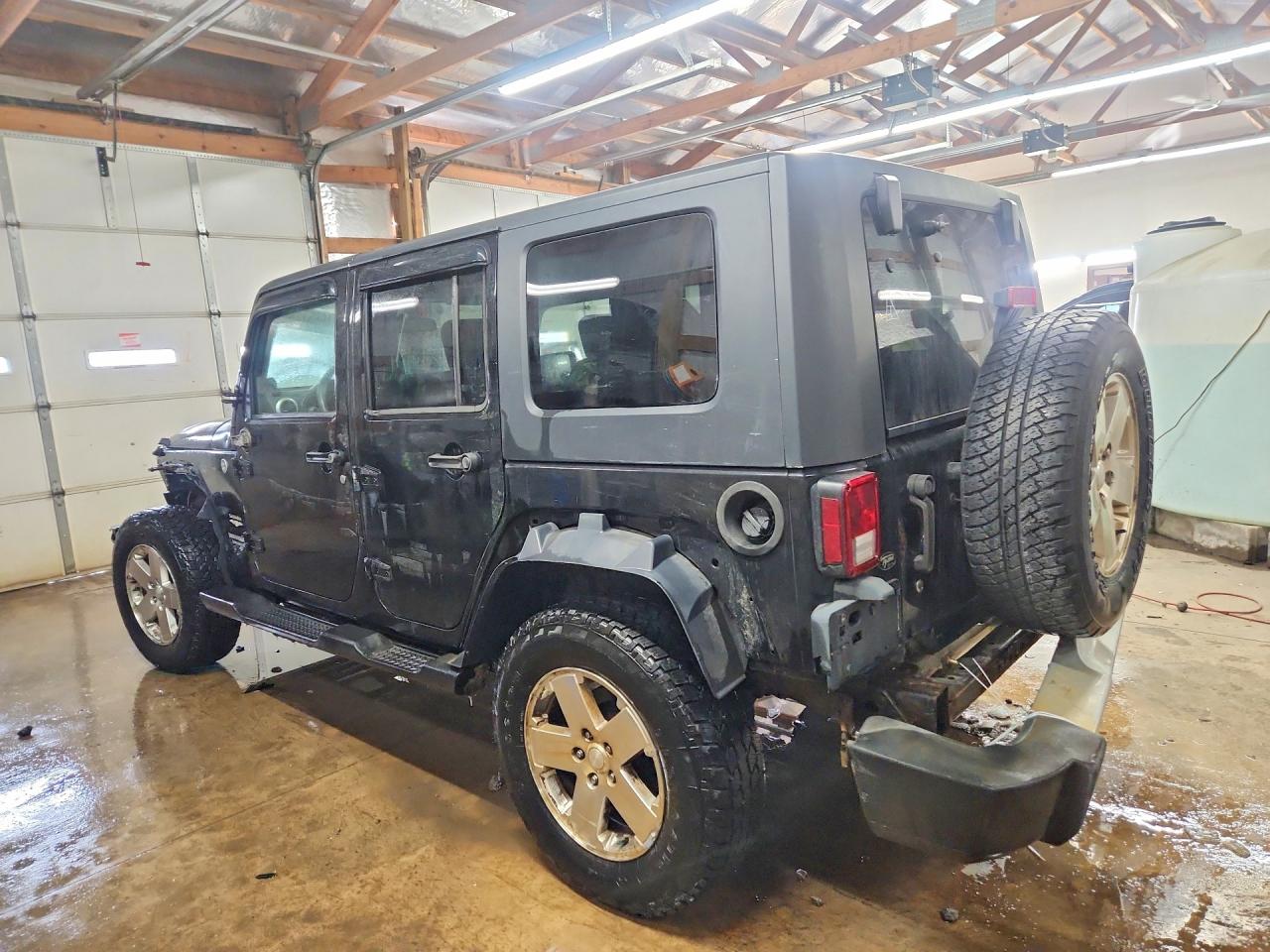 2009 Jeep Wrangler Unlimited Sahara Black vin: 1J4GA59149L749734