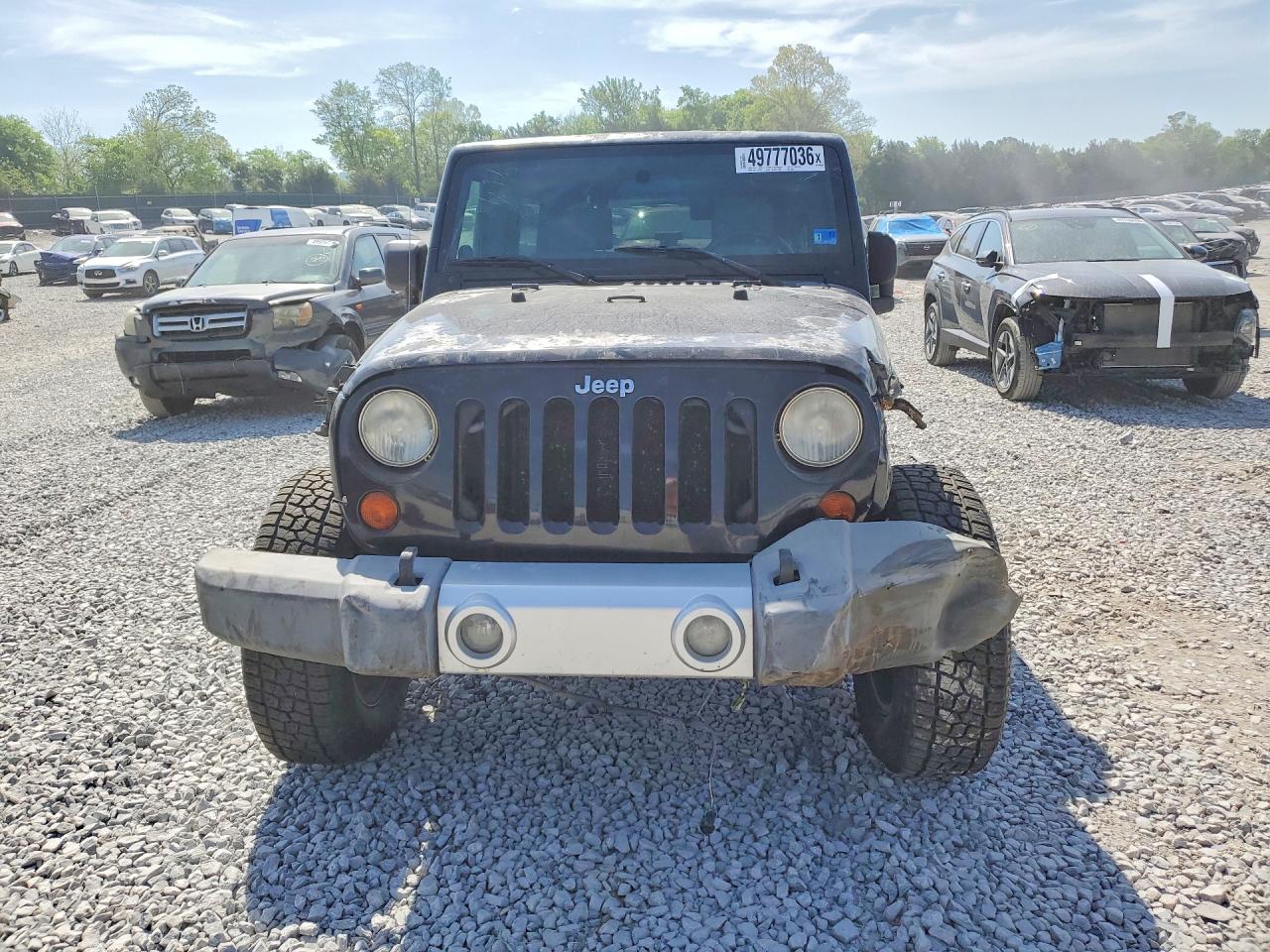 2009 Jeep Wrangler Unlimited Sahara Black vin: 1J4GA59149L760524