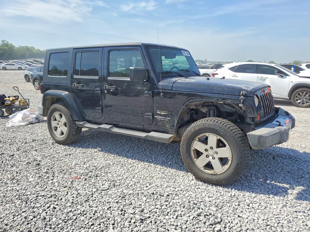 2009 Jeep Wrangler Unlimited Sahara Black vin: 1J4GA59149L760524