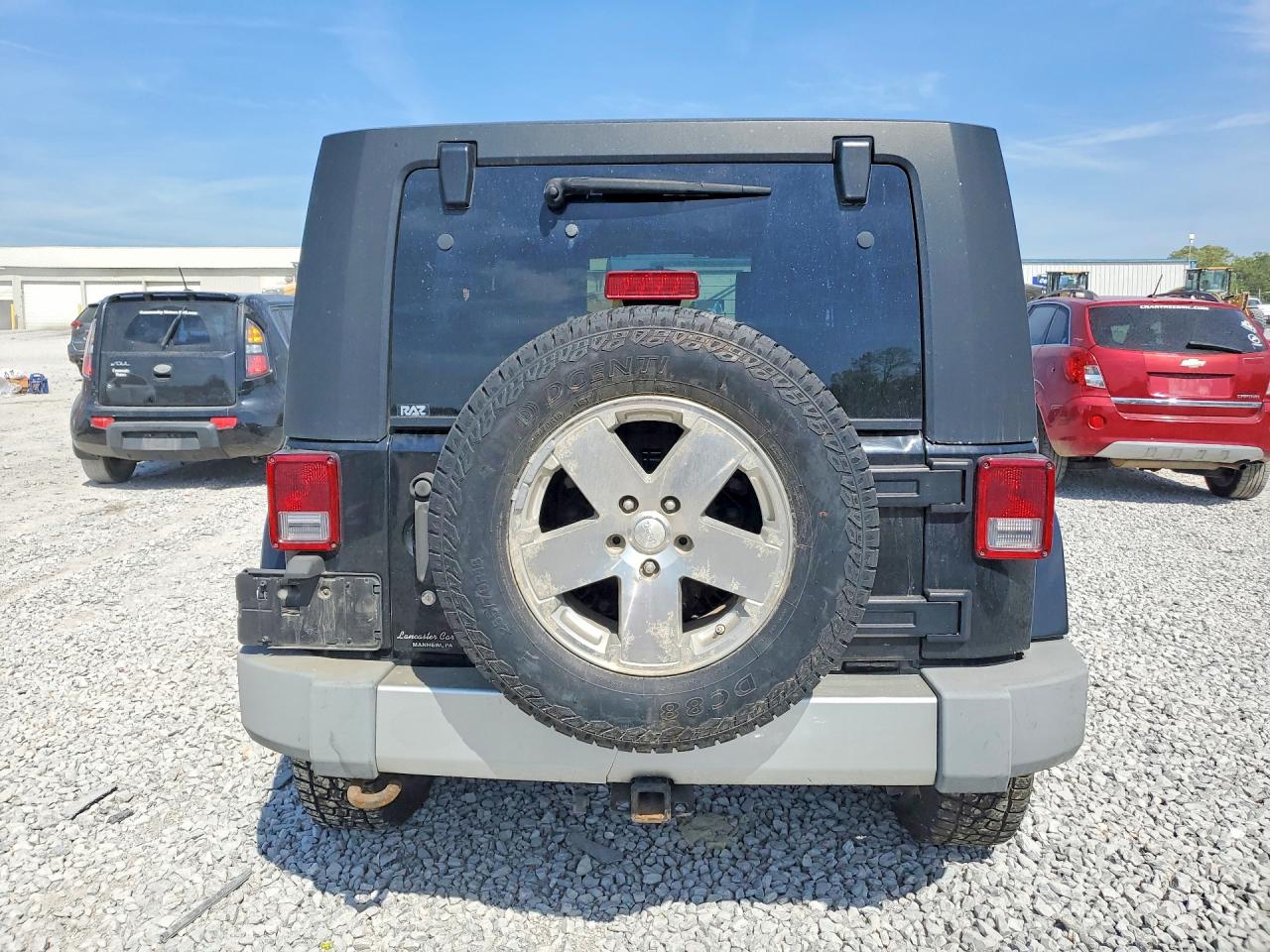 2009 Jeep Wrangler Unlimited Sahara Black vin: 1J4GA59149L760524