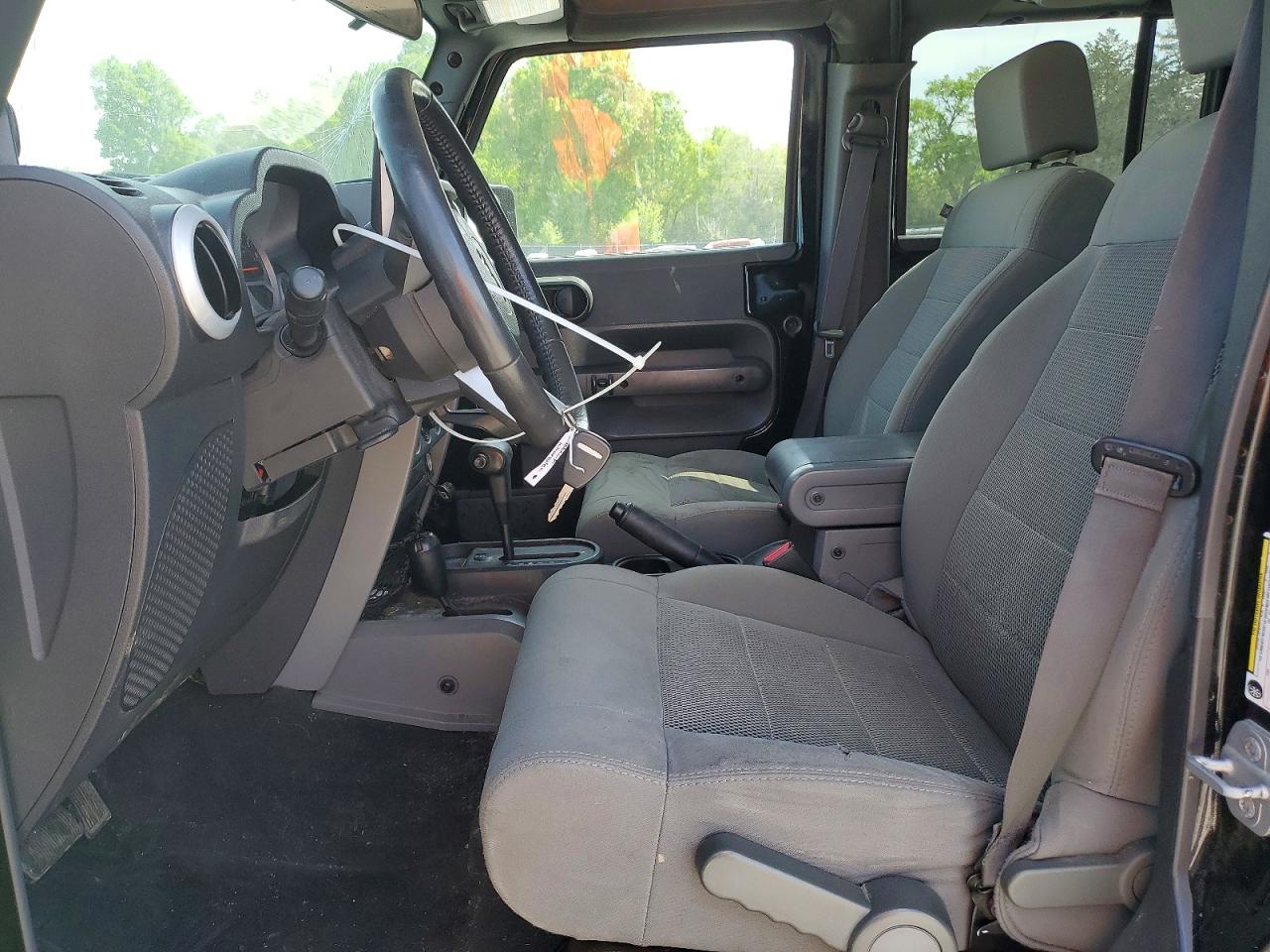 2009 Jeep Wrangler Unlimited Sahara Black vin: 1J4GA59149L760524