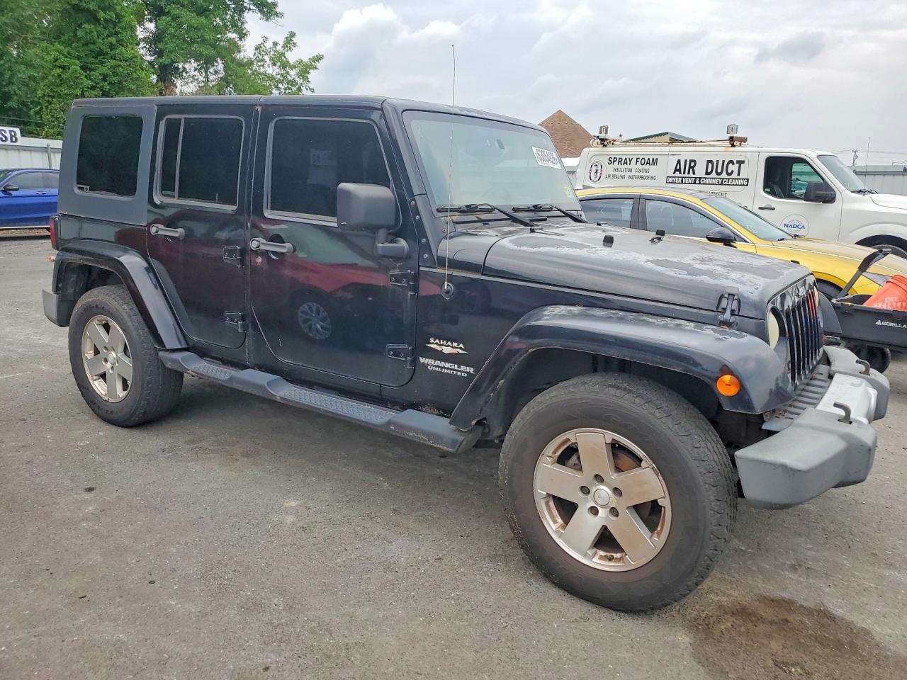 2009 Jeep Wrangler Unlimited Sahara Black vin: 1J4GA59149L775542