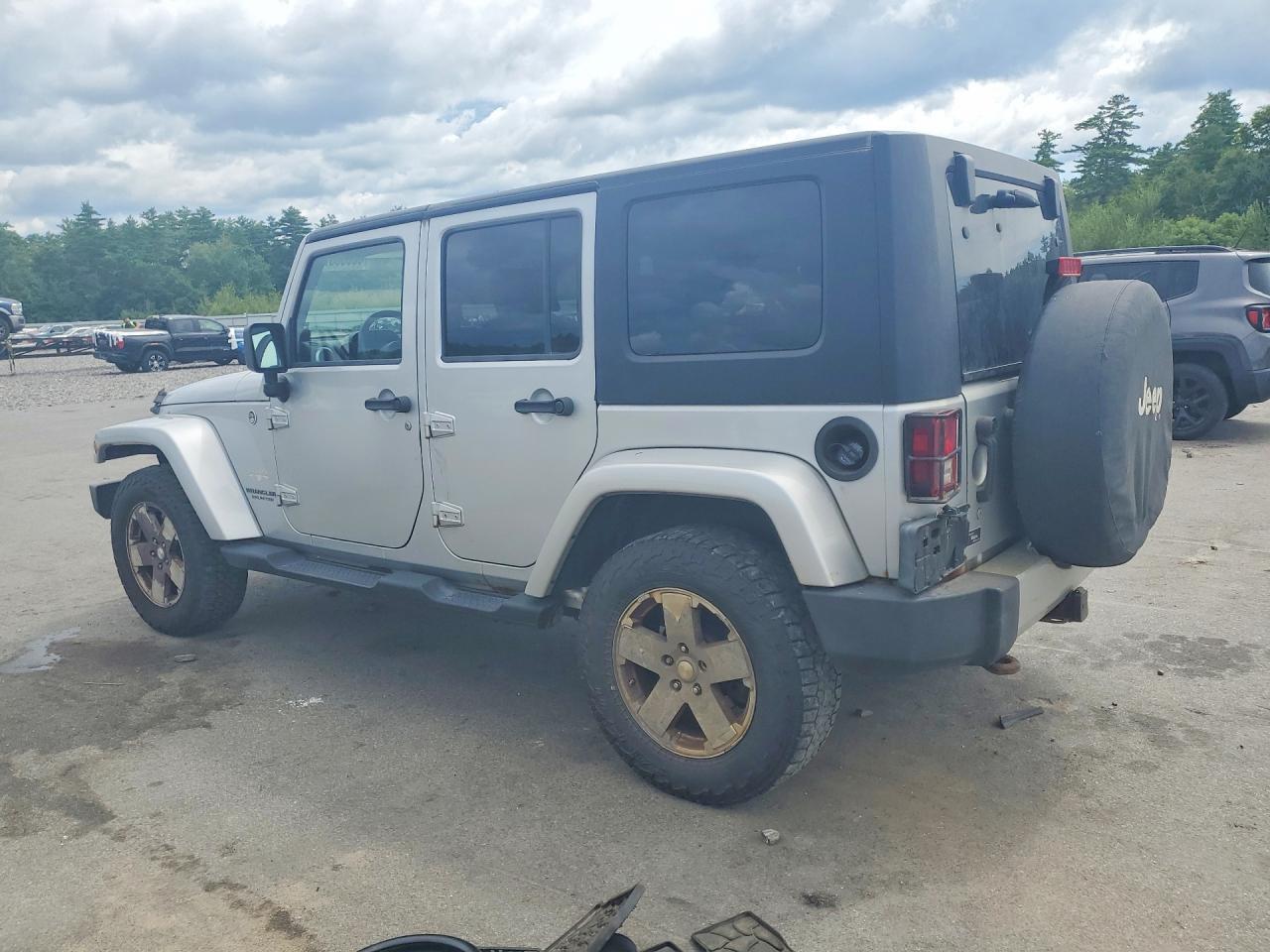2009 Jeep Wrangler Unlimited Sahara Silver vin: 1J4GA59169L772433