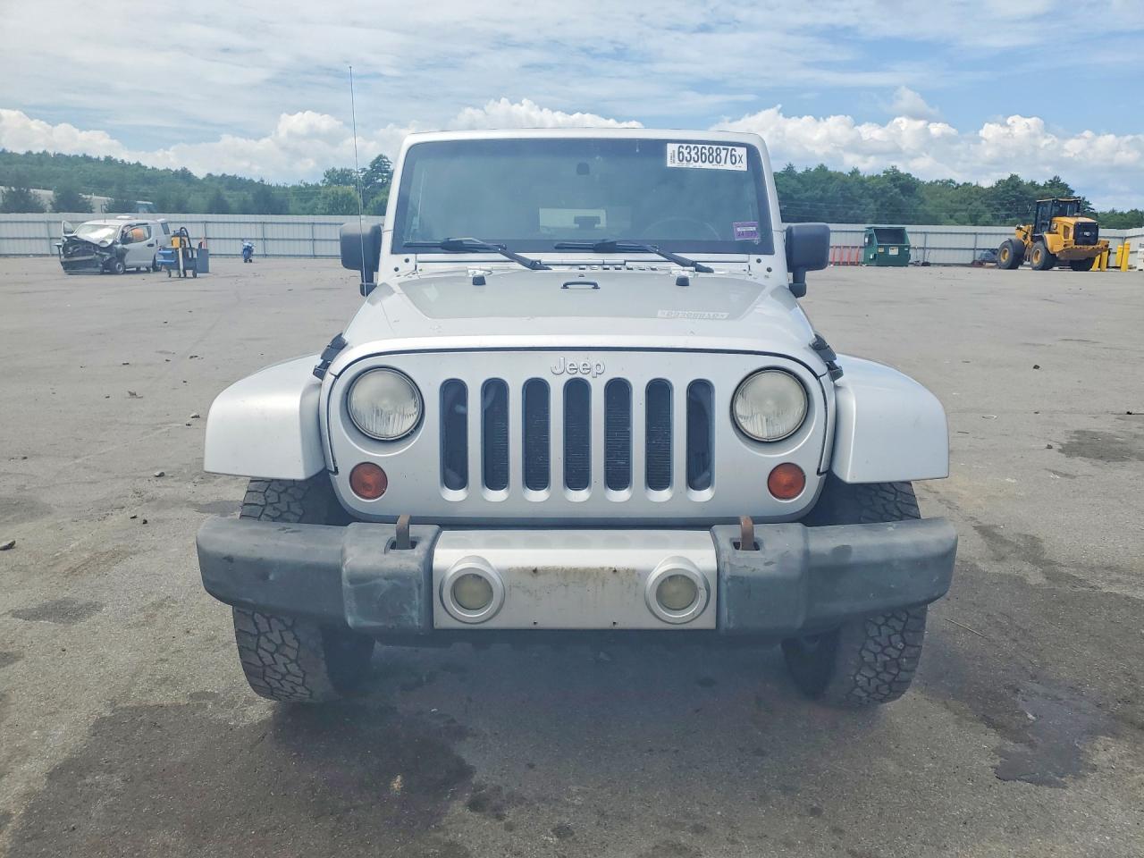 2009 Jeep Wrangler Unlimited Sahara Silver vin: 1J4GA59169L772433