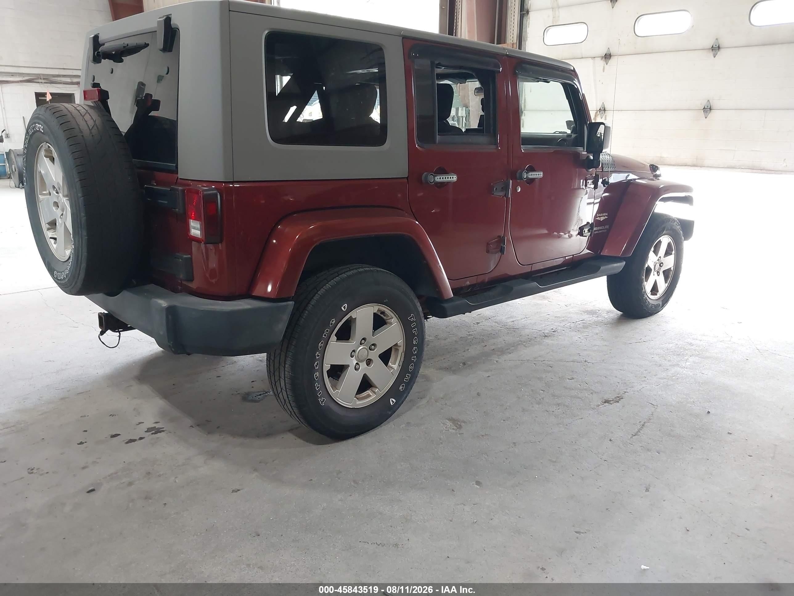 2007 Jeep Wrangler Unlimited Sahara Burgundy vin: 1J4GA59177L113273