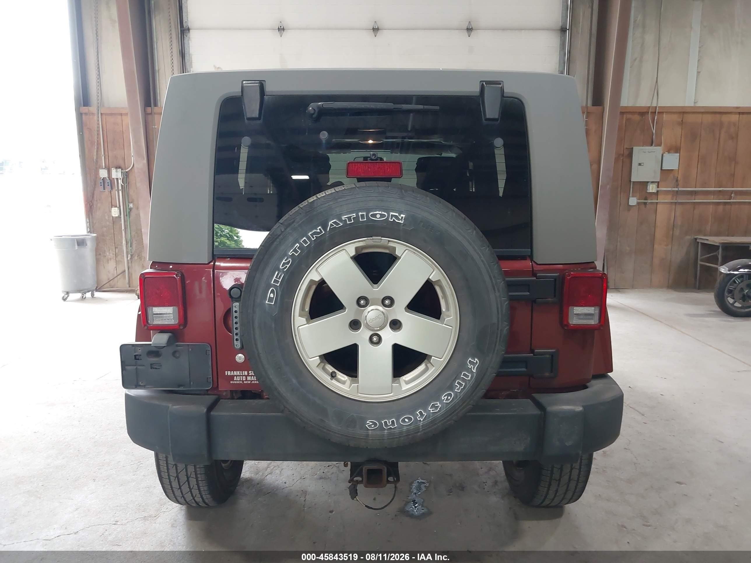 2007 Jeep Wrangler Unlimited Sahara Burgundy vin: 1J4GA59177L113273