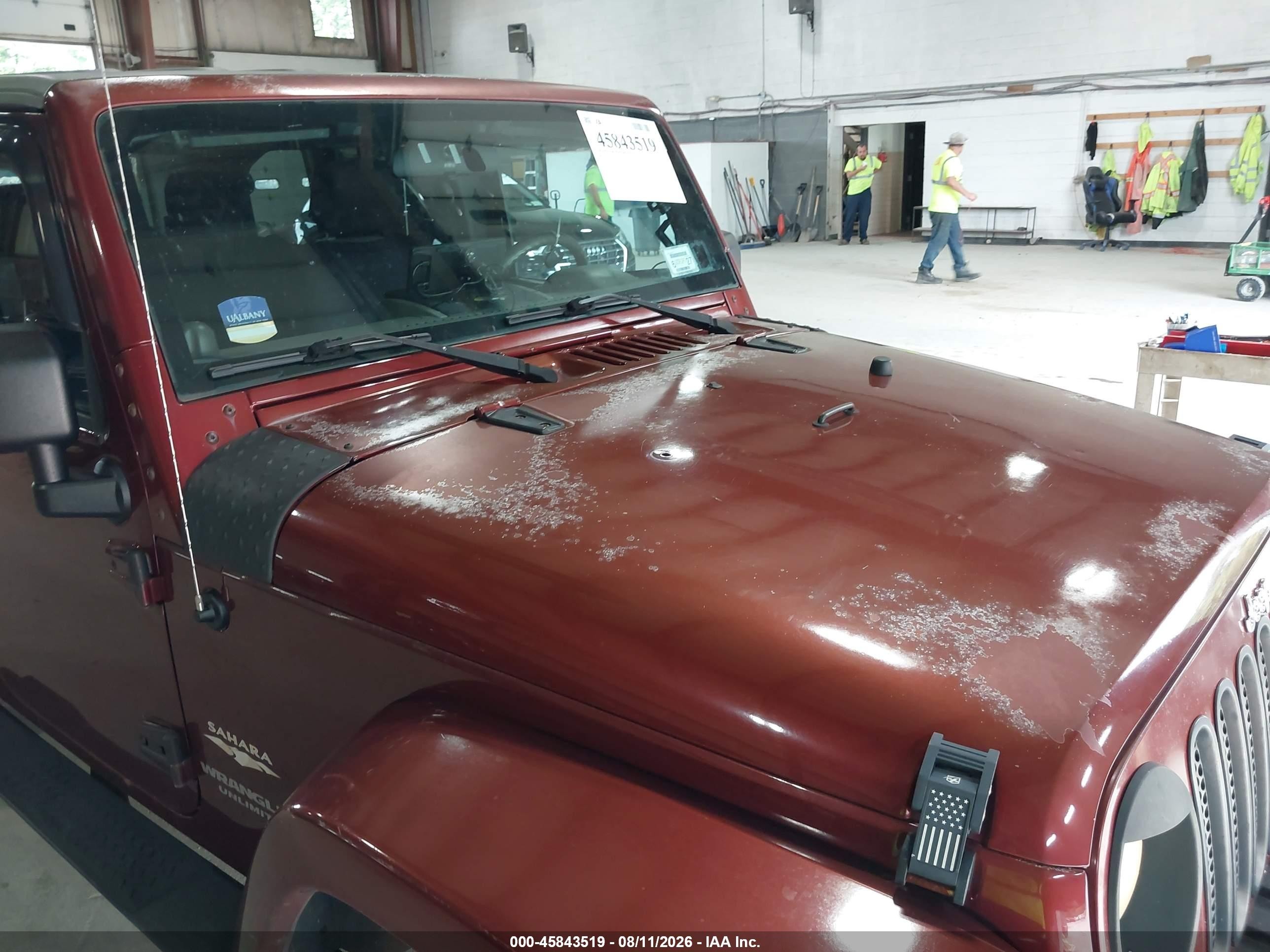 2007 Jeep Wrangler Unlimited Sahara Burgundy vin: 1J4GA59177L113273
