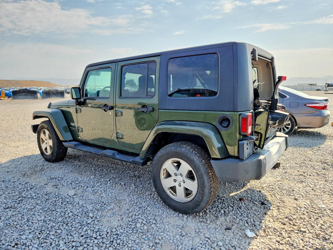 2008 Jeep Wrangler Unlimited Sahara Зеленый vin: 1J4GA59178L615878