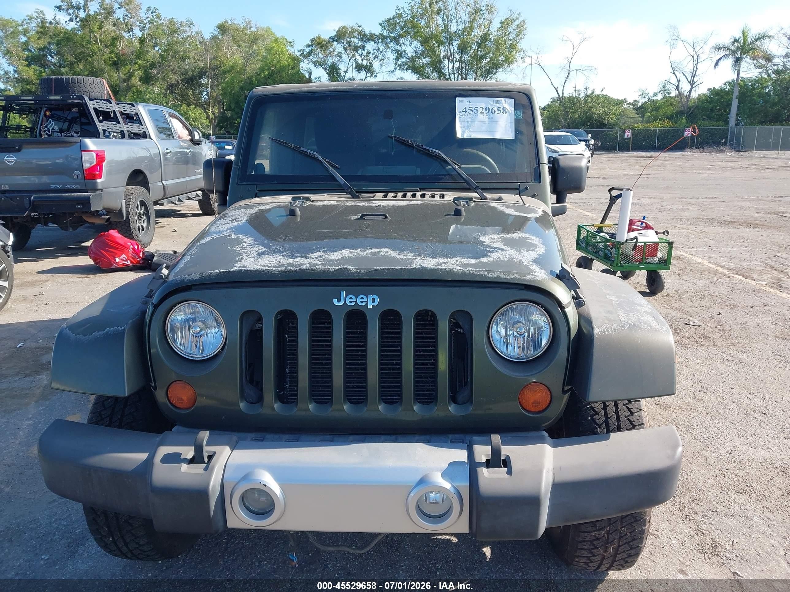 2007 Jeep Wrangler Unlimited Sahara Green vin: 1J4GA59187L157962