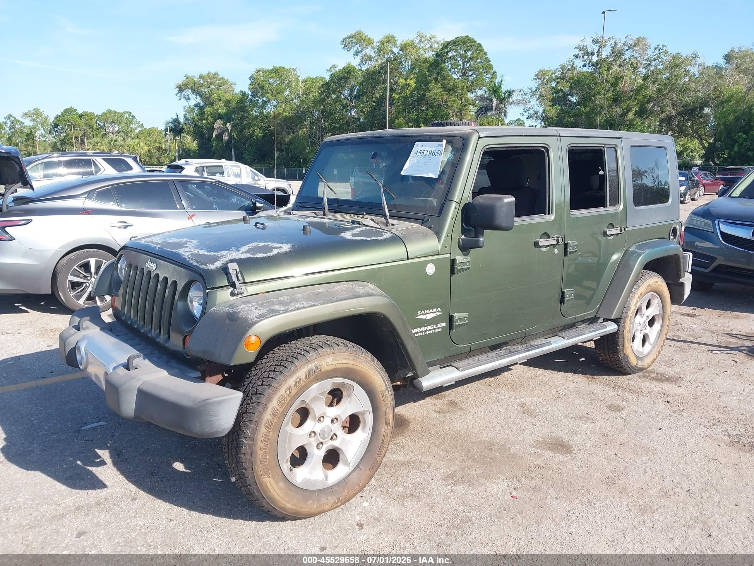 2007 Jeep Wrangler Unlimited Sahara Green vin: 1J4GA59187L157962