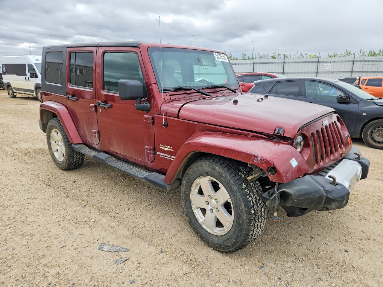 2009 Jeep Wrangler Unlimited Sahara Maroon vin: 1J4GA59189L747937