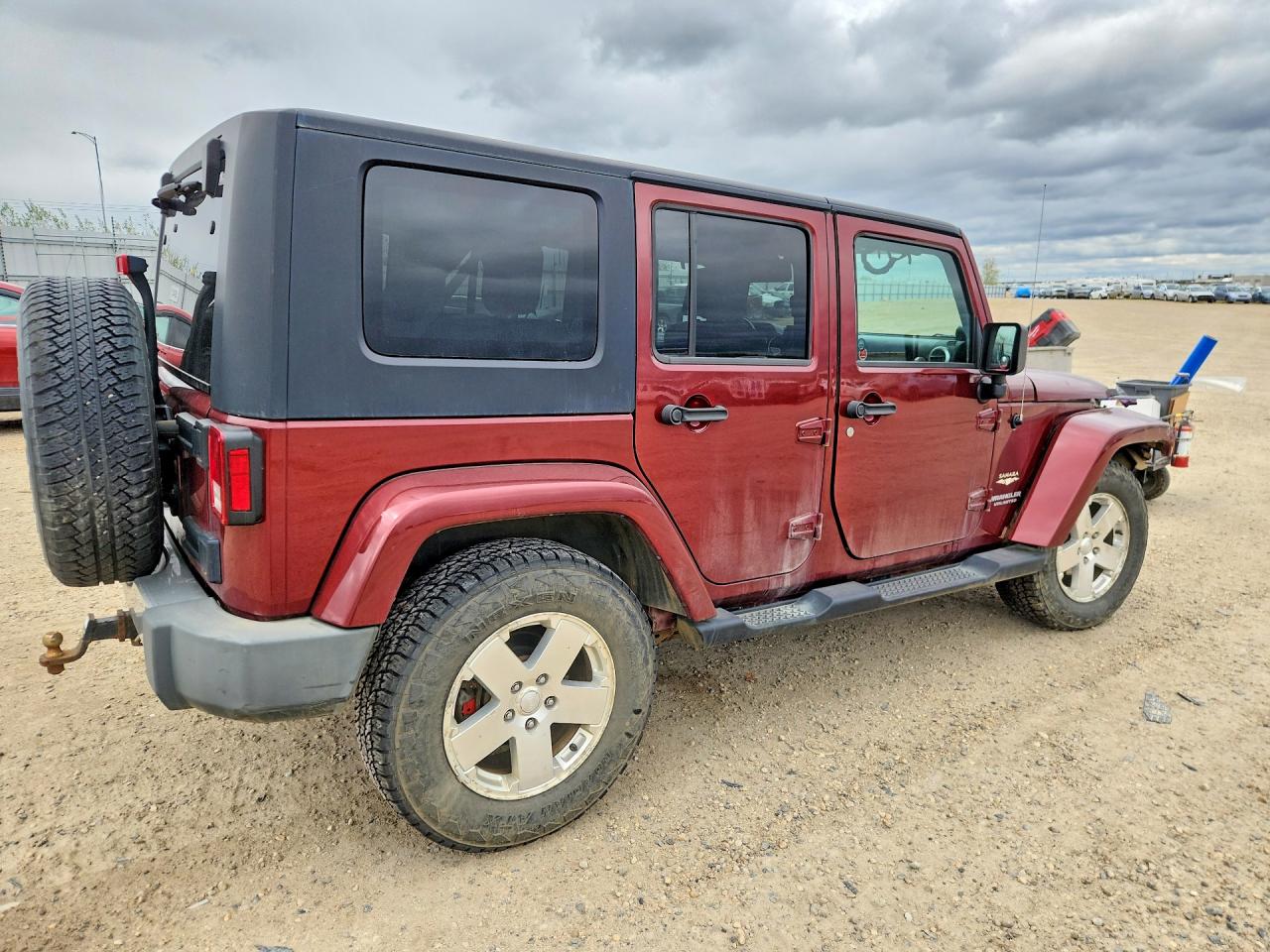 2009 Jeep Wrangler Unlimited Sahara Maroon vin: 1J4GA59189L747937