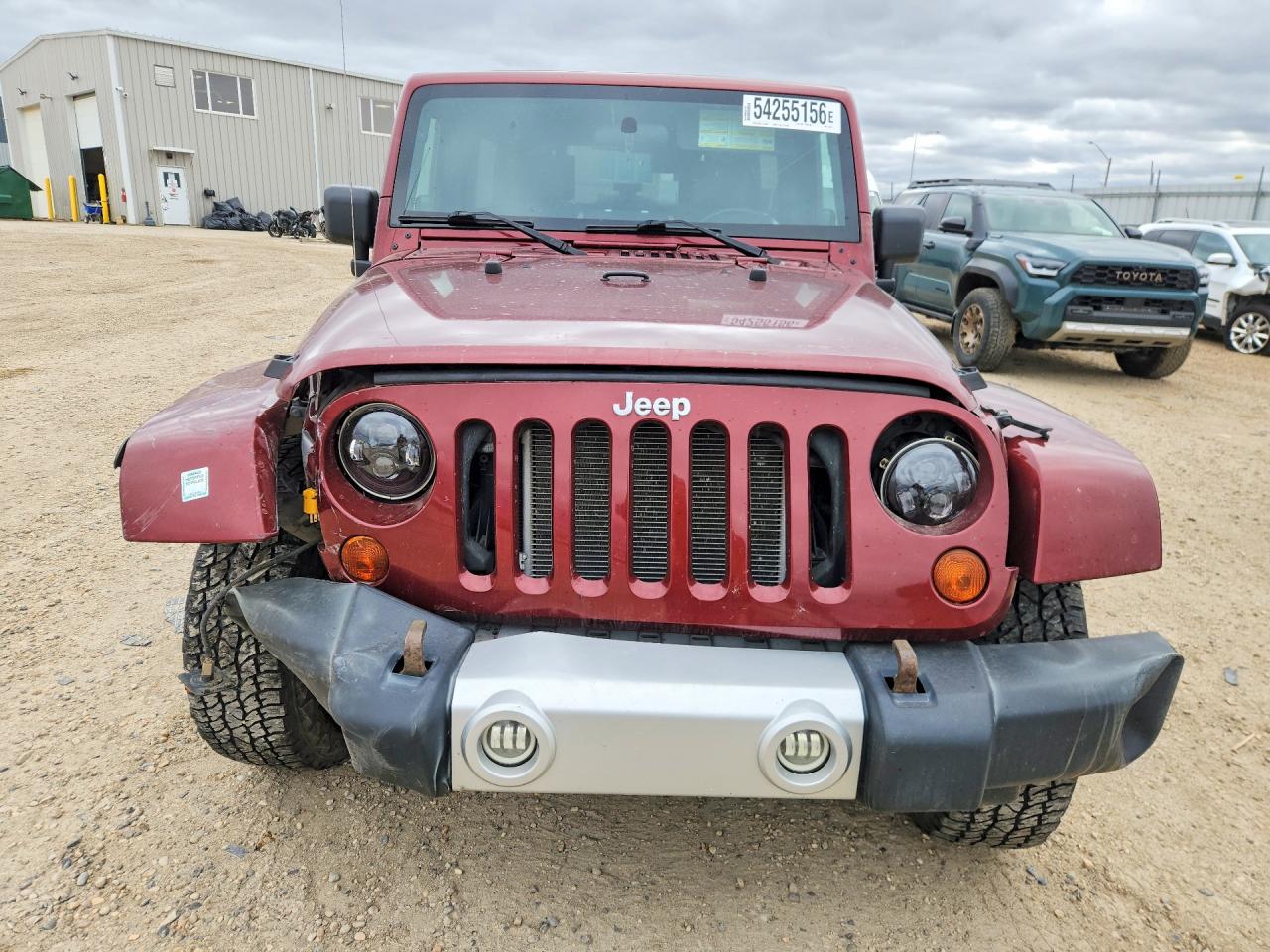 2009 Jeep Wrangler Unlimited Sahara Maroon vin: 1J4GA59189L747937