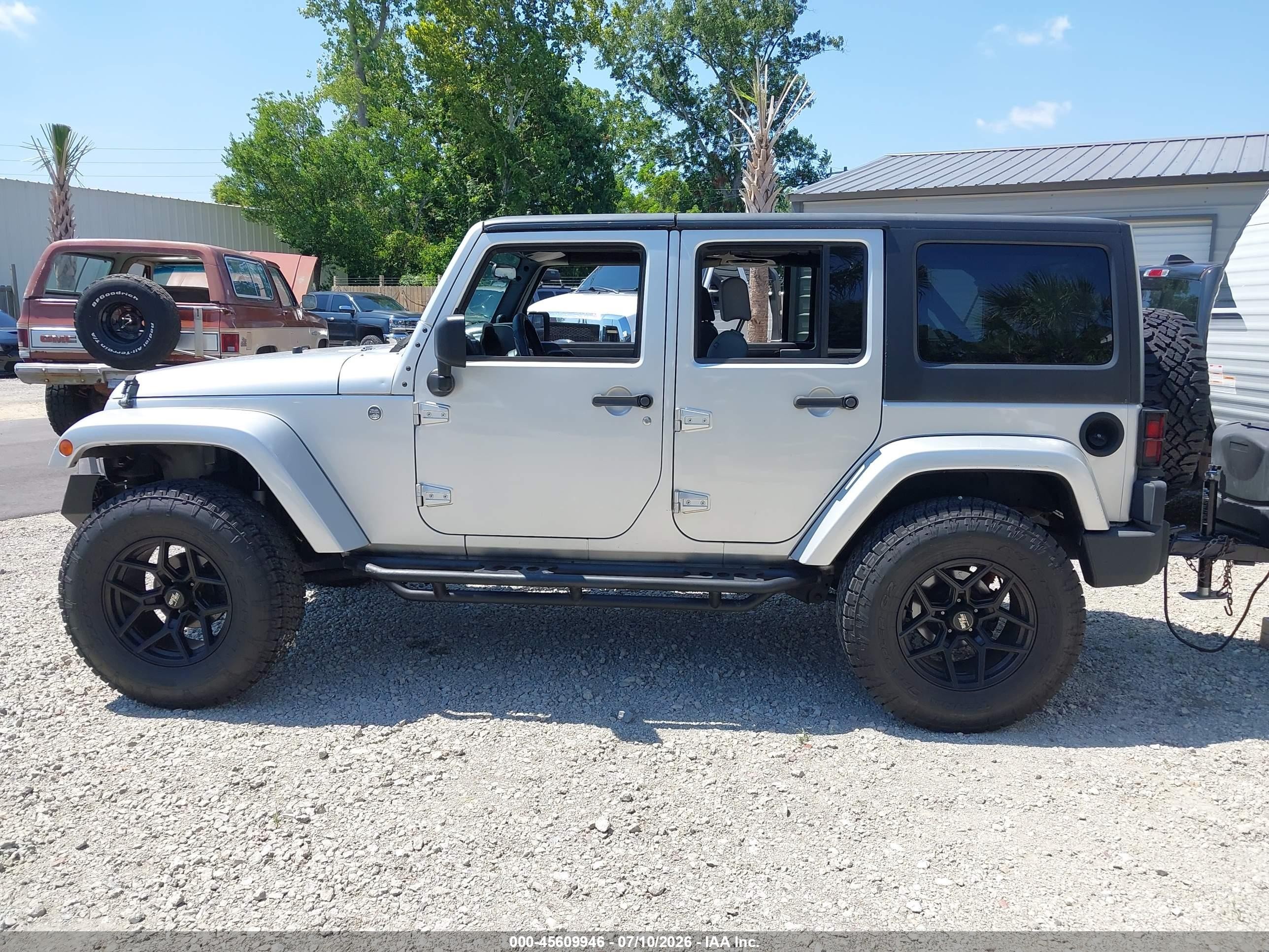 2007 Jeep Wrangler Unlimited Sahara Серебряный vin: 1J4GA59197L170025