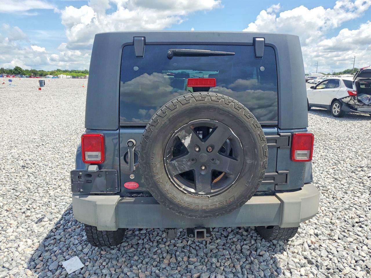 2008 Jeep Wrangler Unlimited Sahara Угольный vin: 1J4GA59198L605336