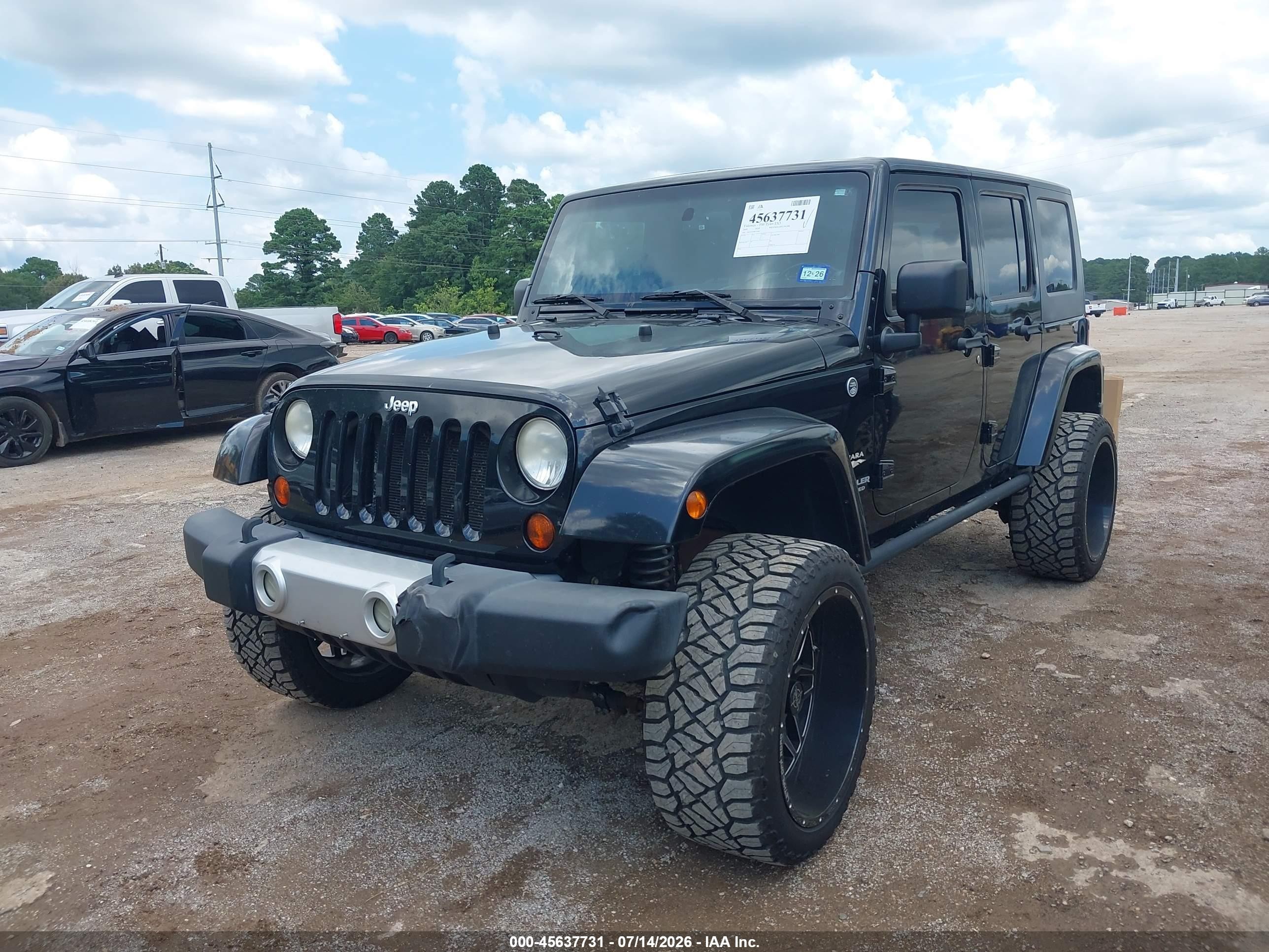 2009 Jeep Wrangler Unlimited Sahara Черный vin: 1J4GA59199L703817
