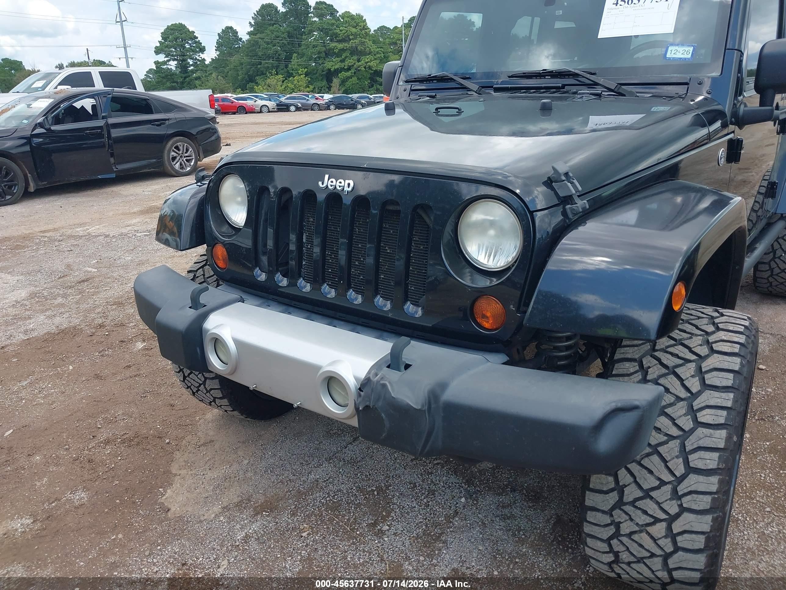 2009 Jeep Wrangler Unlimited Sahara Черный vin: 1J4GA59199L703817