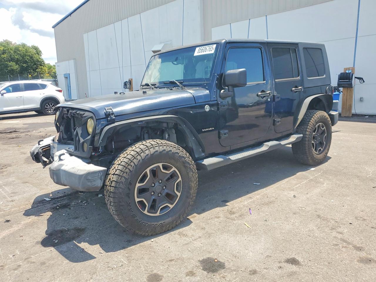 2009 Jeep Wrangler Unlimited Sahara Черный vin: 1J4GA591X9L705012