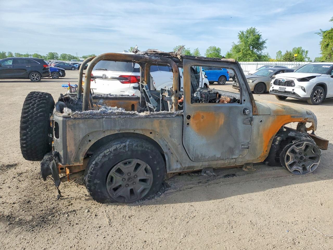 2010 Jeep Wrangler Sahara Burn vin: 1J4GA5D12AL149631
