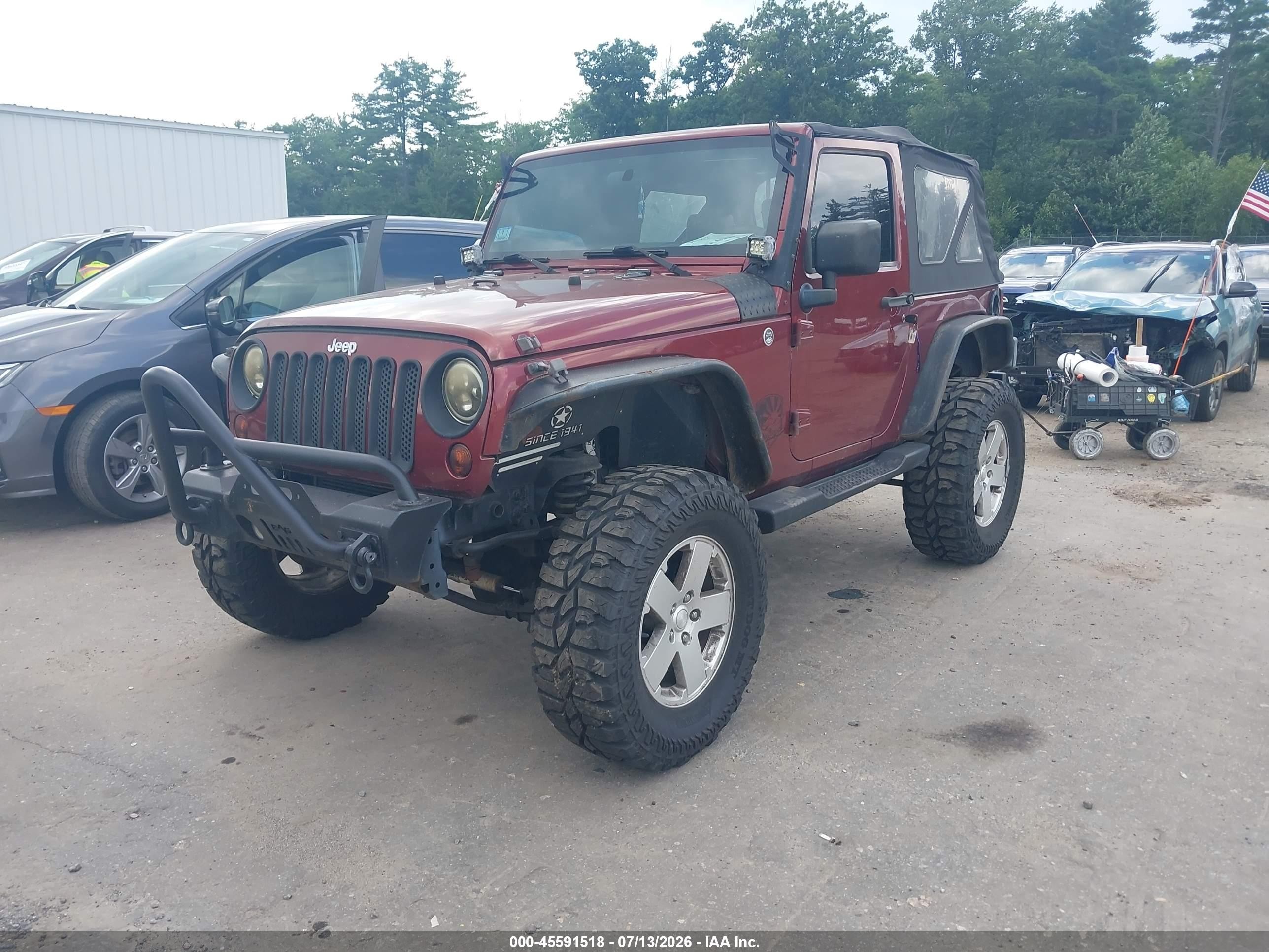 2010 Jeep Wrangler Sahara Red vin: 1J4GA5D19AL140537