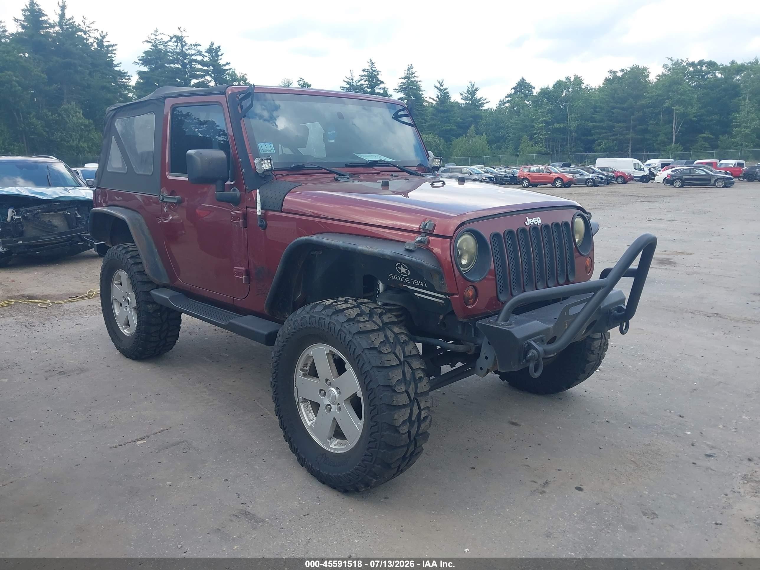 2010 Jeep Wrangler Sahara Red vin: 1J4GA5D19AL140537