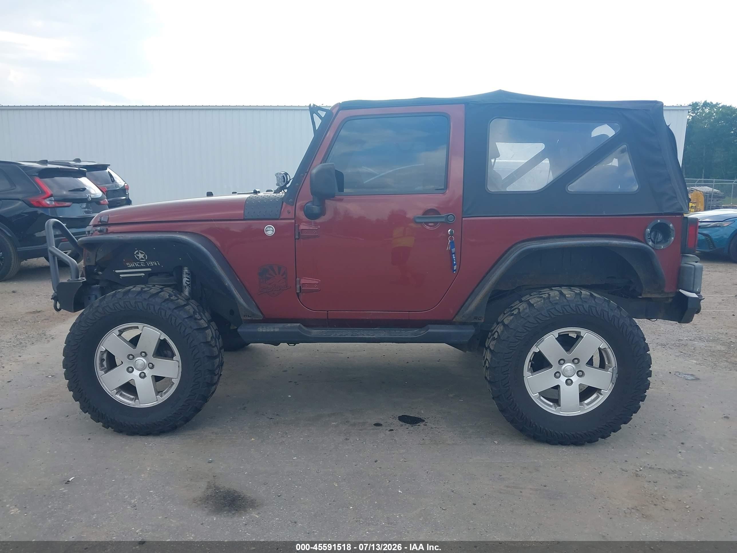 2010 Jeep Wrangler Sahara Red vin: 1J4GA5D19AL140537