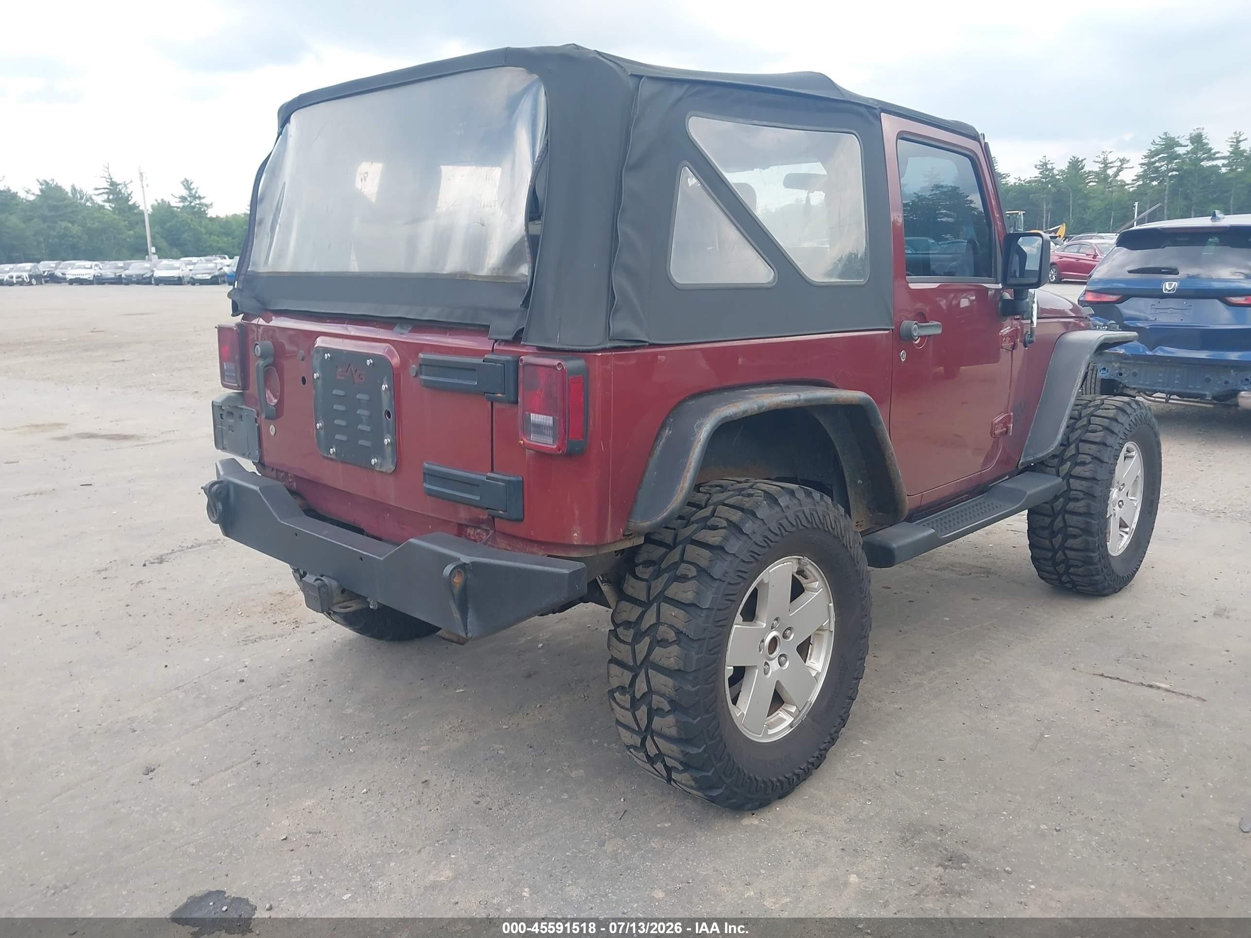 2010 Jeep Wrangler Sahara Red vin: 1J4GA5D19AL140537