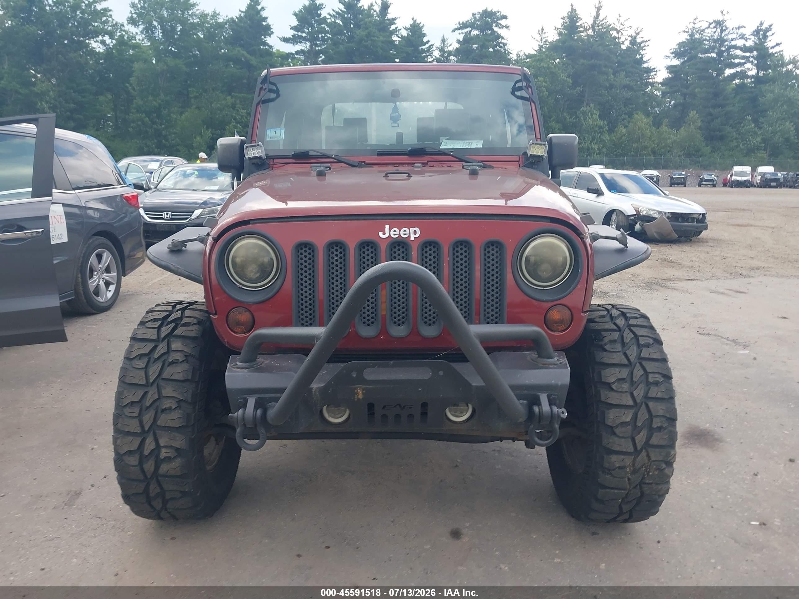 2010 Jeep Wrangler Sahara Red vin: 1J4GA5D19AL140537