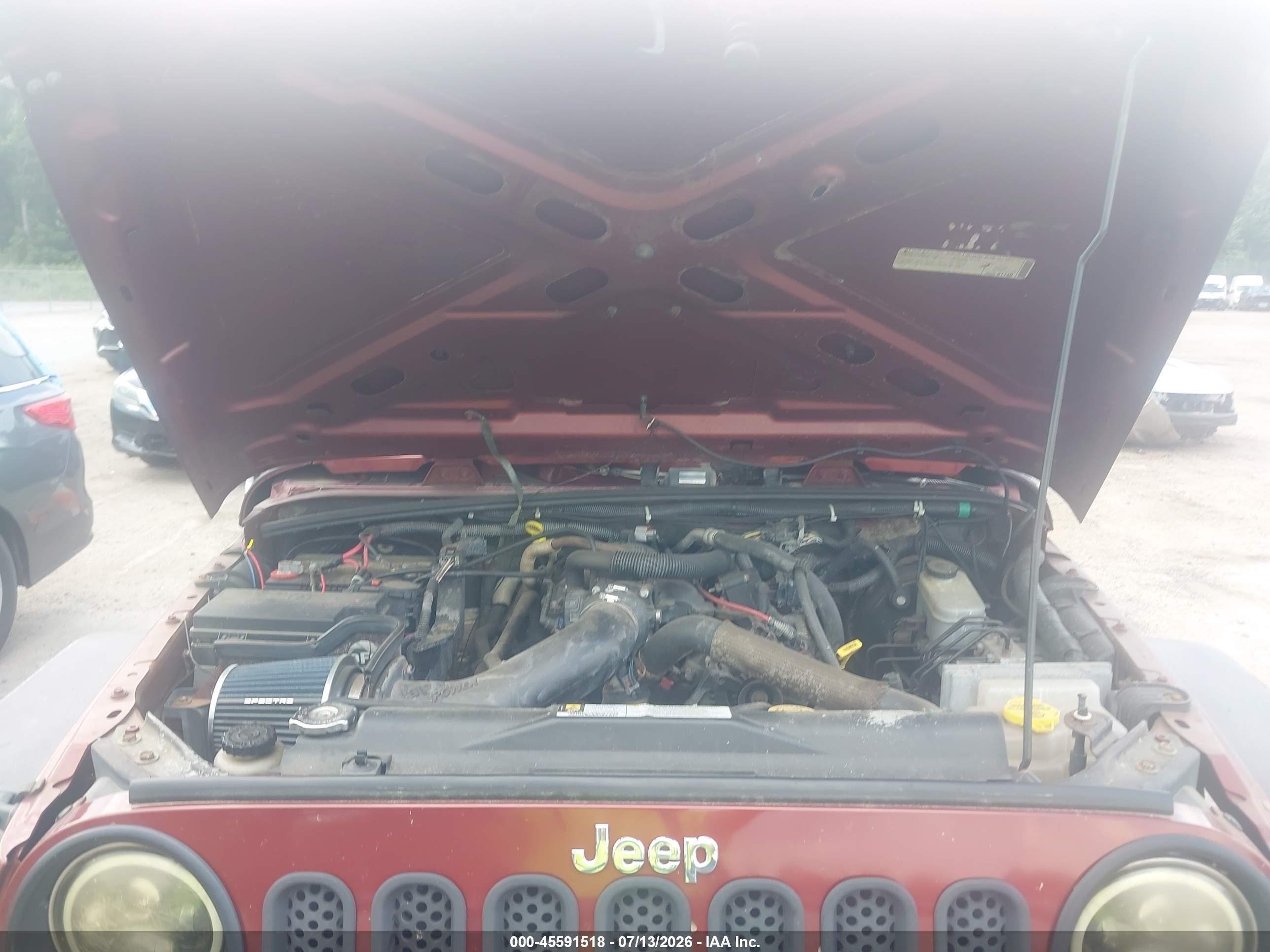 2010 Jeep Wrangler Sahara Red vin: 1J4GA5D19AL140537