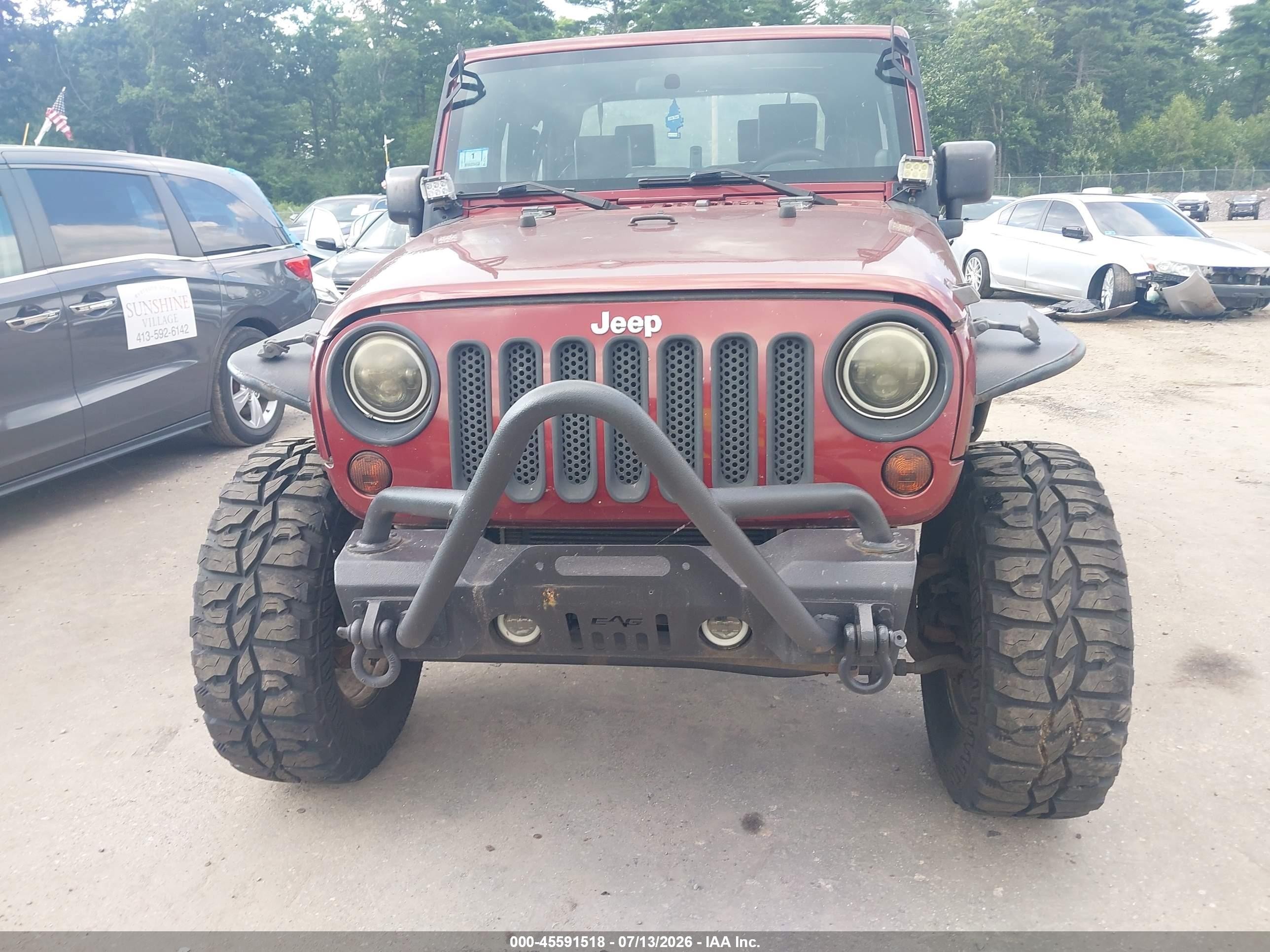 2010 Jeep Wrangler Sahara Red vin: 1J4GA5D19AL140537