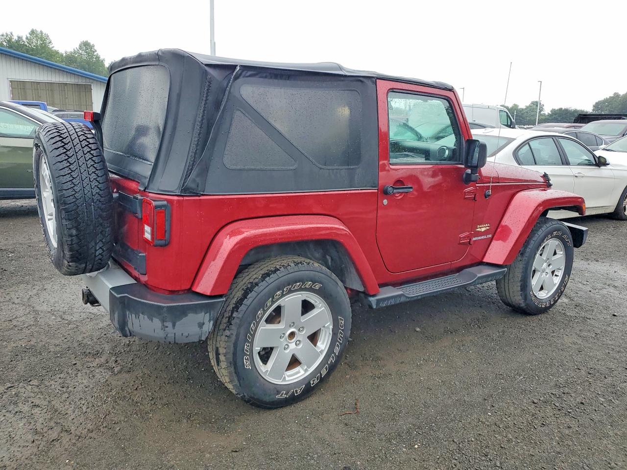 2011 Jeep Wrangler Sahara Burgundy vin: 1J4GA5D19BL518938