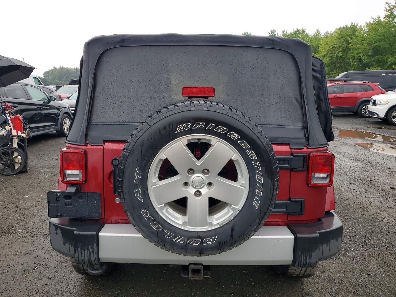 2011 Jeep Wrangler Sahara Burgundy vin: 1J4GA5D19BL518938