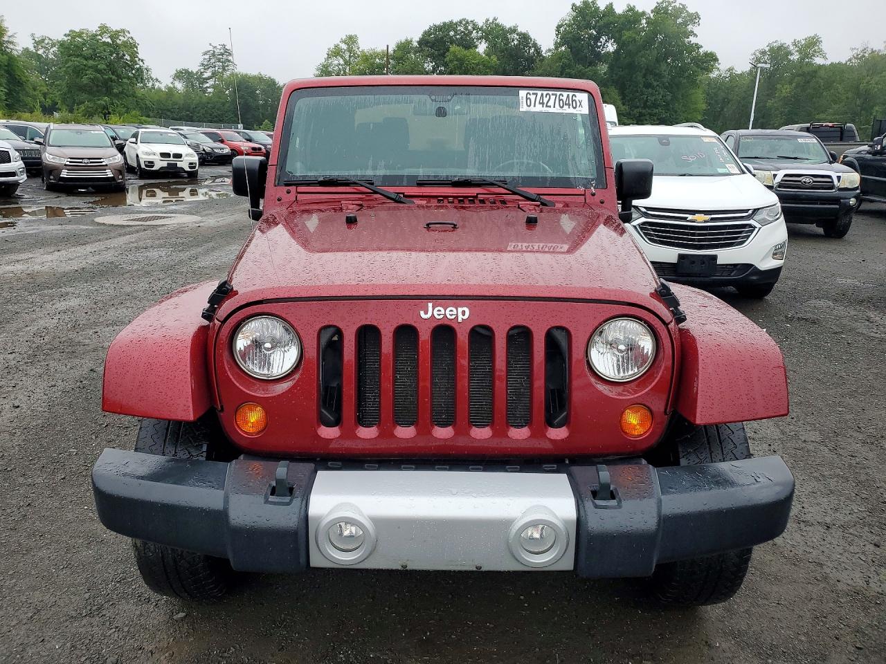 2011 Jeep Wrangler Sahara Burgundy vin: 1J4GA5D19BL518938